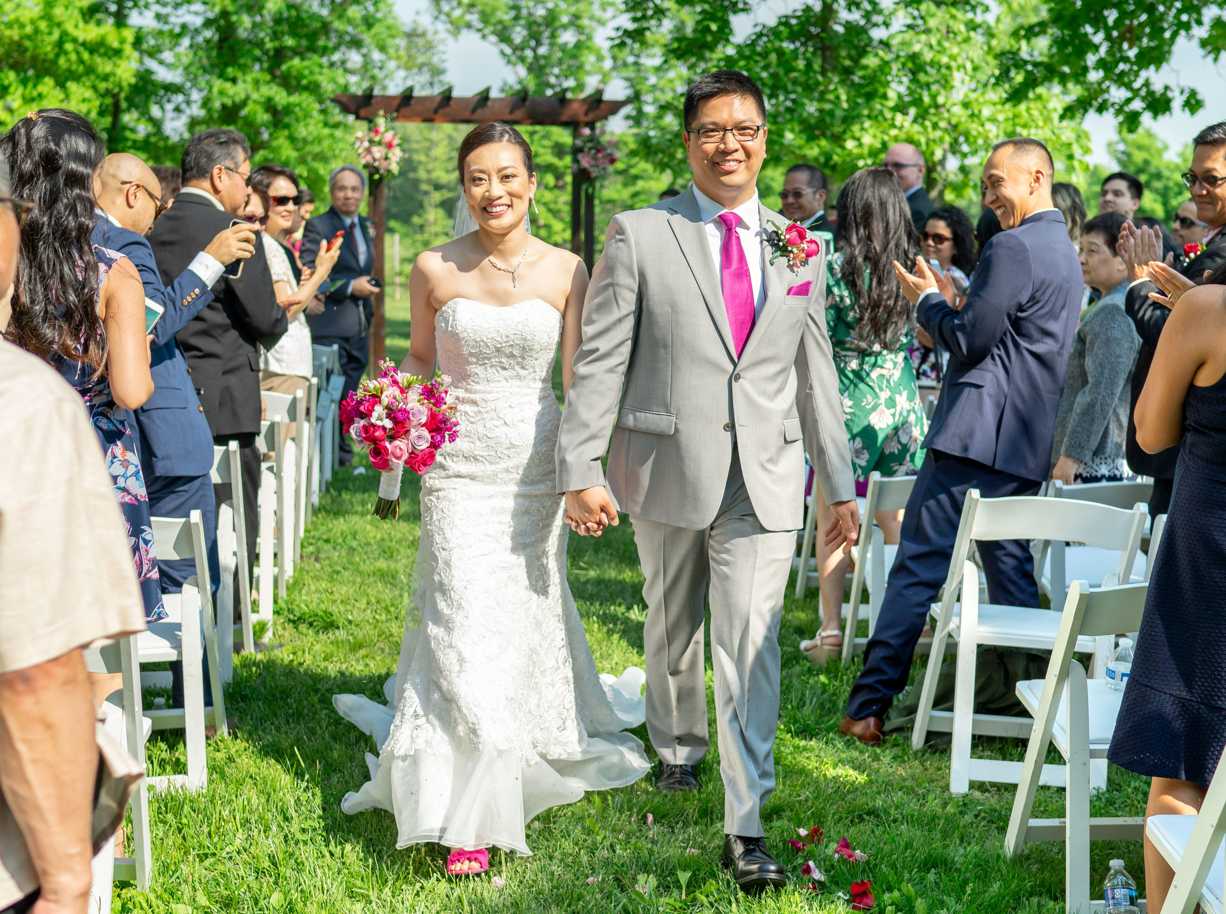 Bride and groom walking down the aisle using Sony eye AF to track