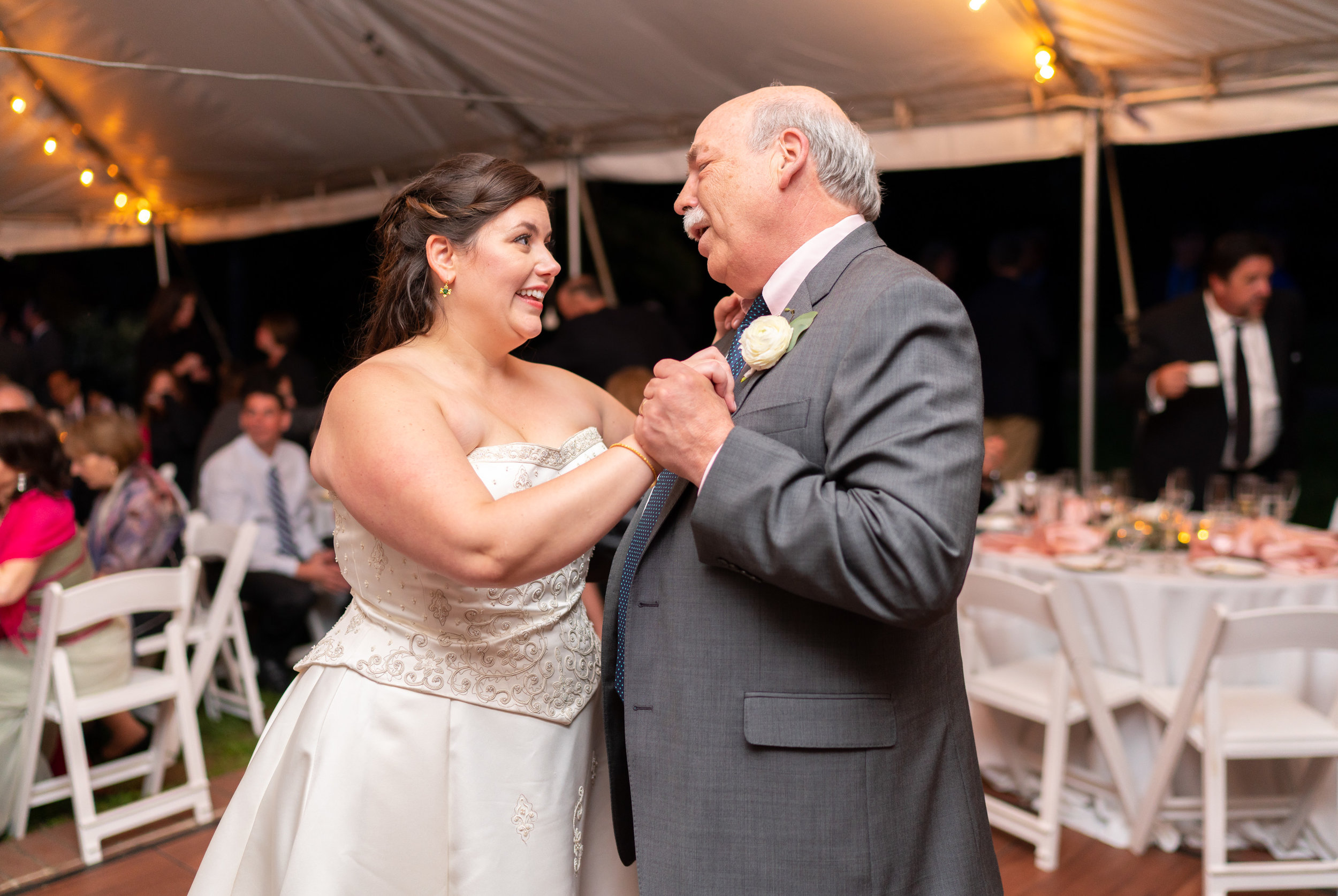 Father daughter dance under twinkle lights and white tent reception at Hendry House wedding