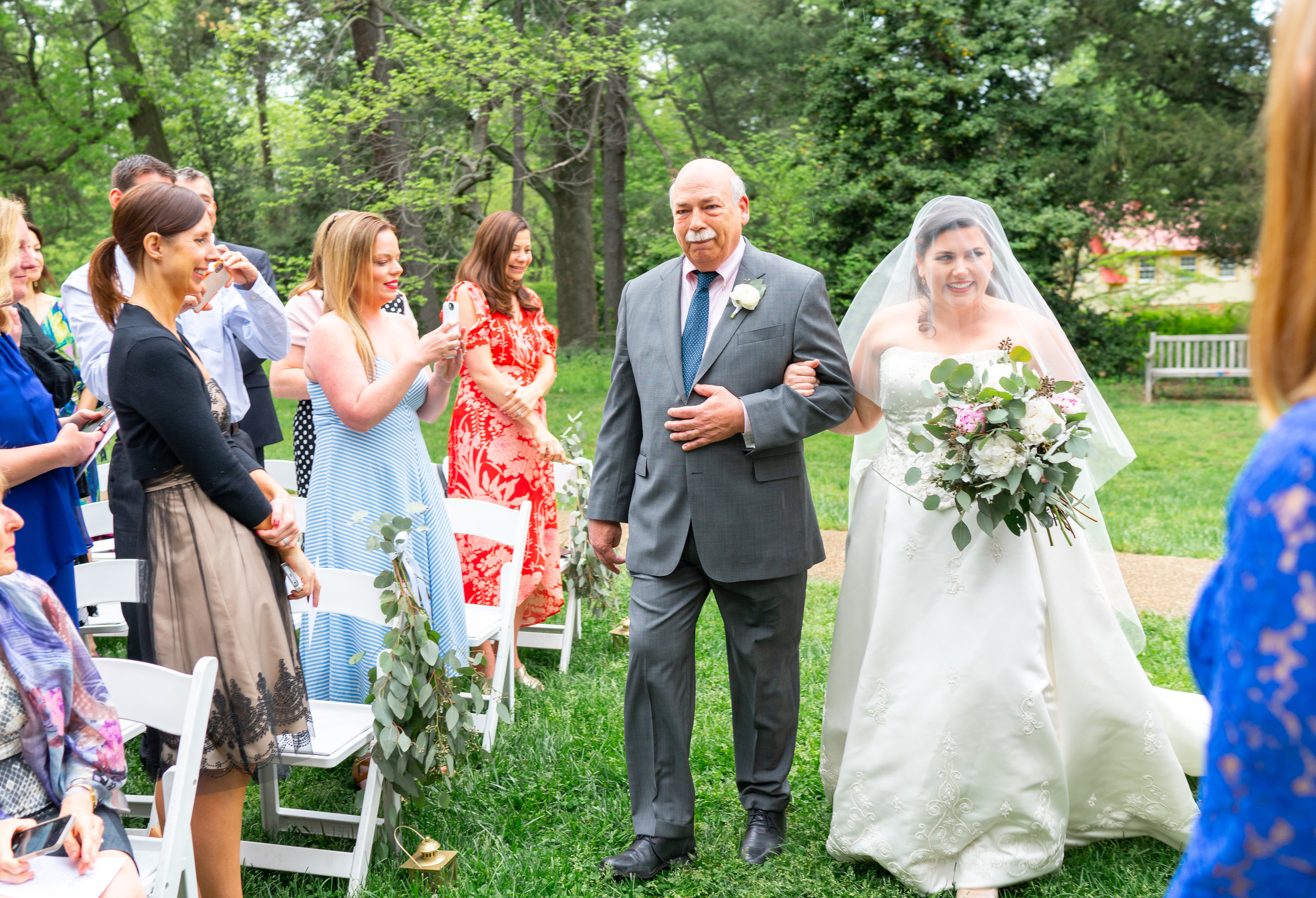 Bride and her father walking down the aisle at Hendry House wedding 