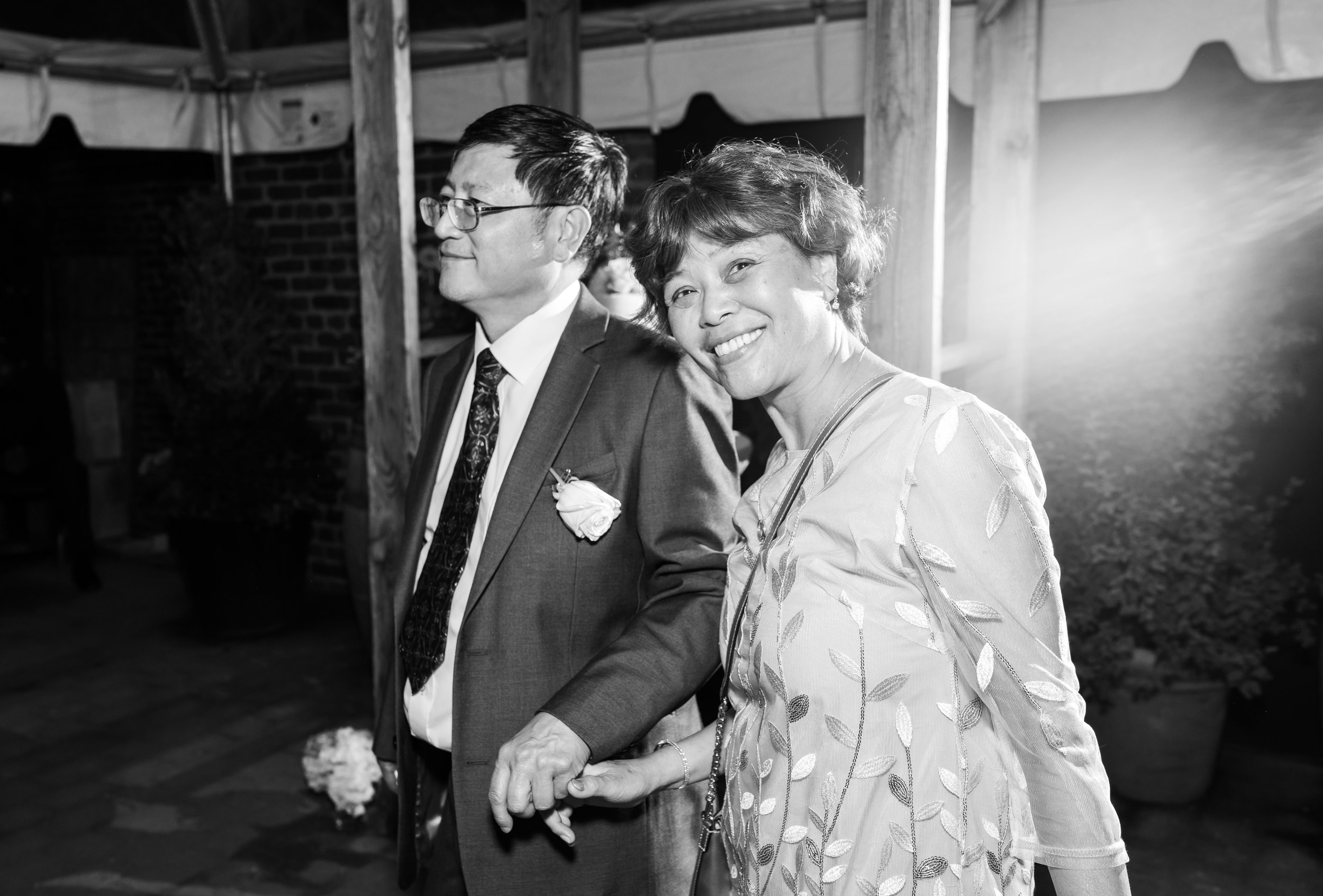 Black and white photo of the mother of the bride on the dance floor at Gallery O on H