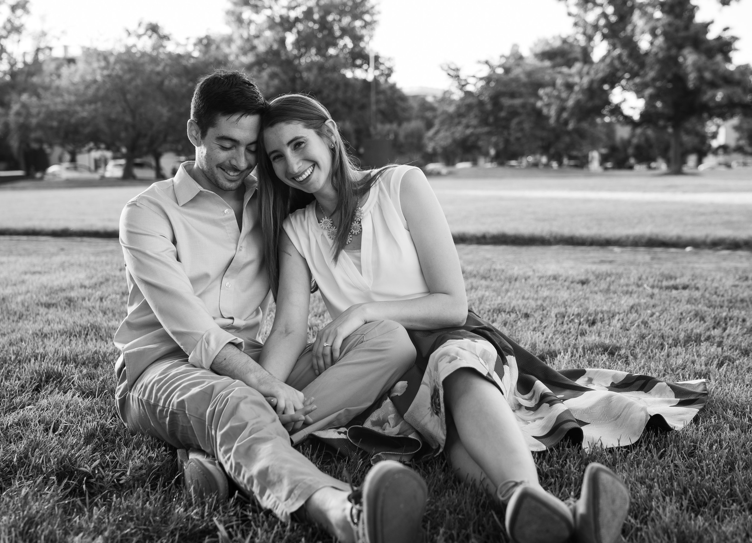 Alexandria waterfront engagement session in the summer on the grass