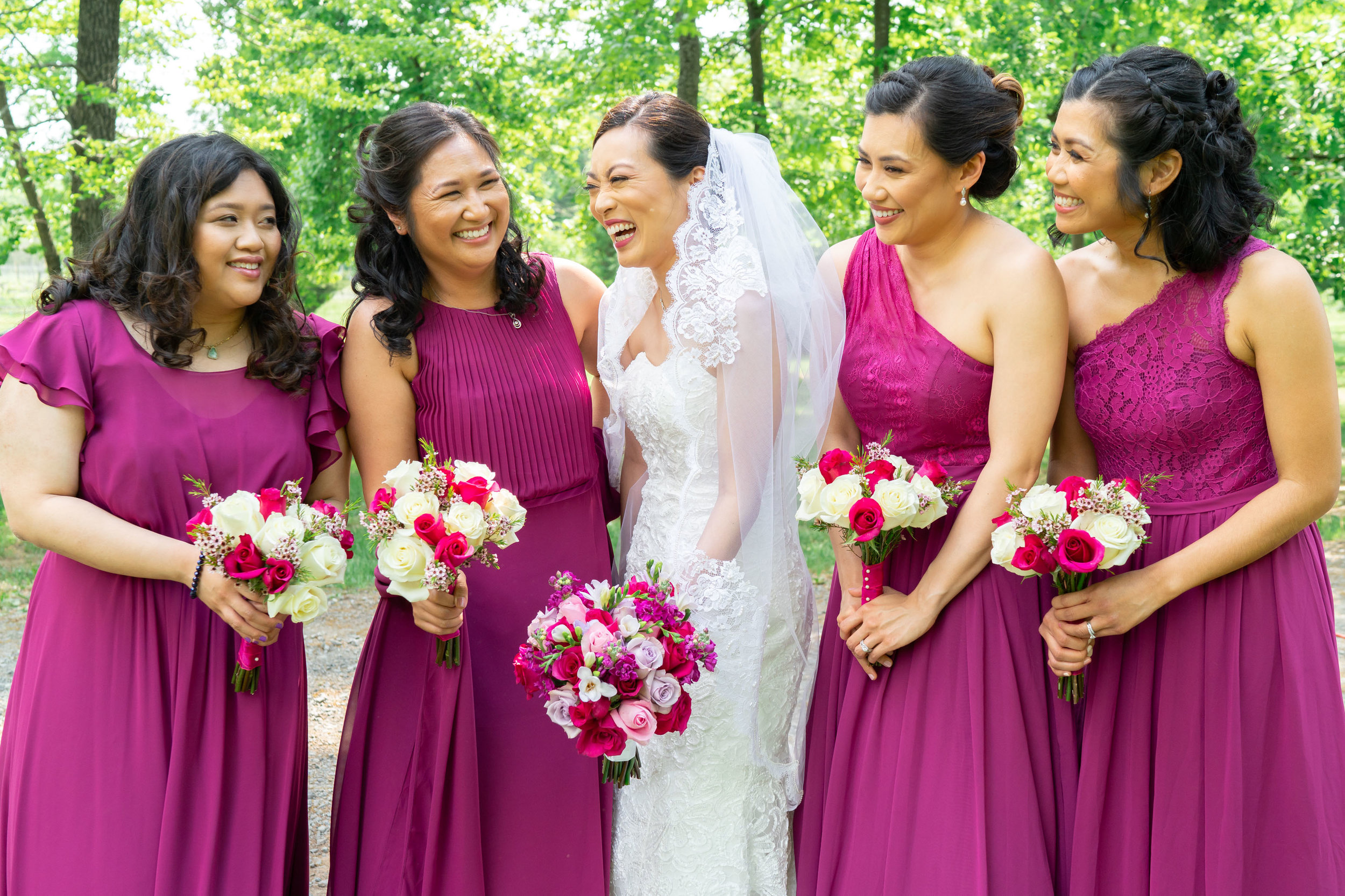 Bride and bridesmaids laughing at Lost Creek Winery wedding