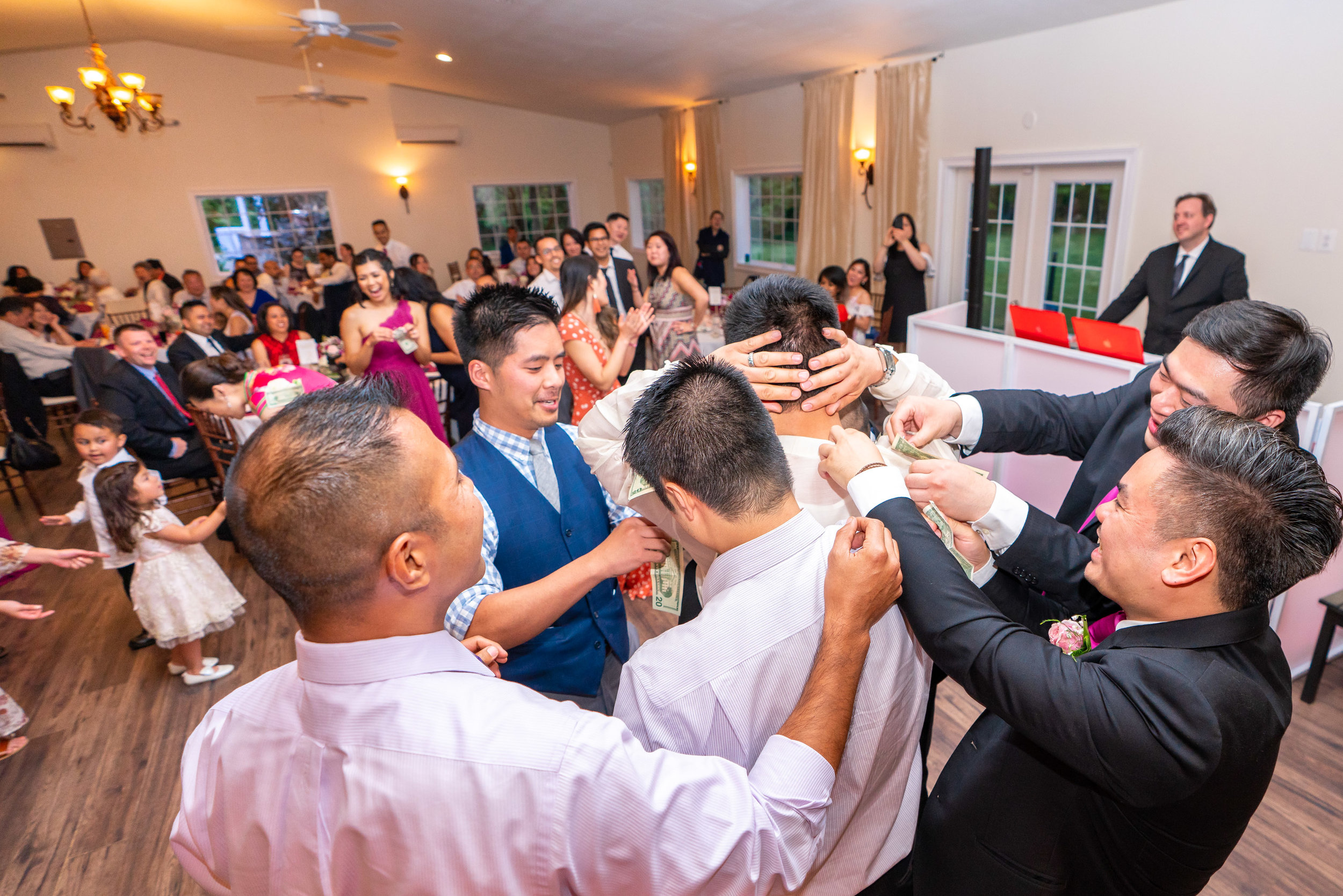Groomsmen at Lost Creek Winery wedding money dance