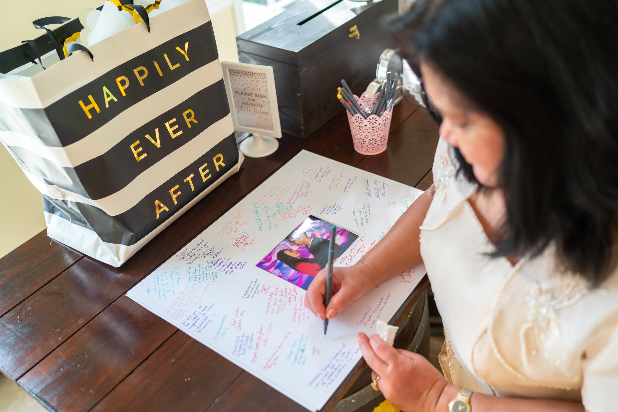 Signing a photo frame instead of traditional guest book 