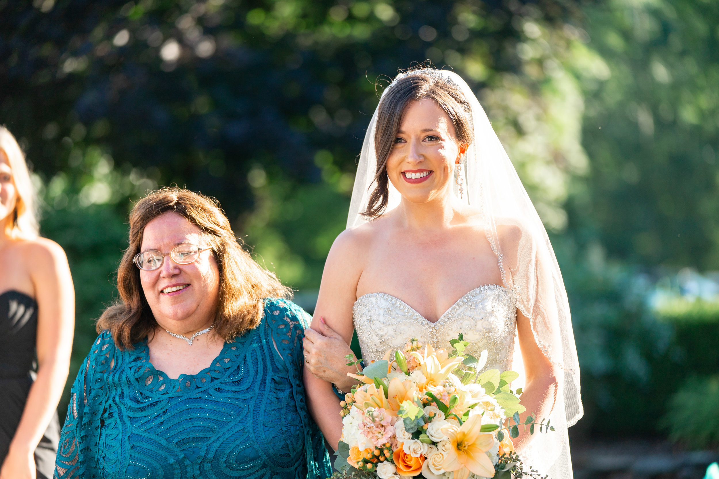 Bride walking down the aisle by jessica nazarova photography