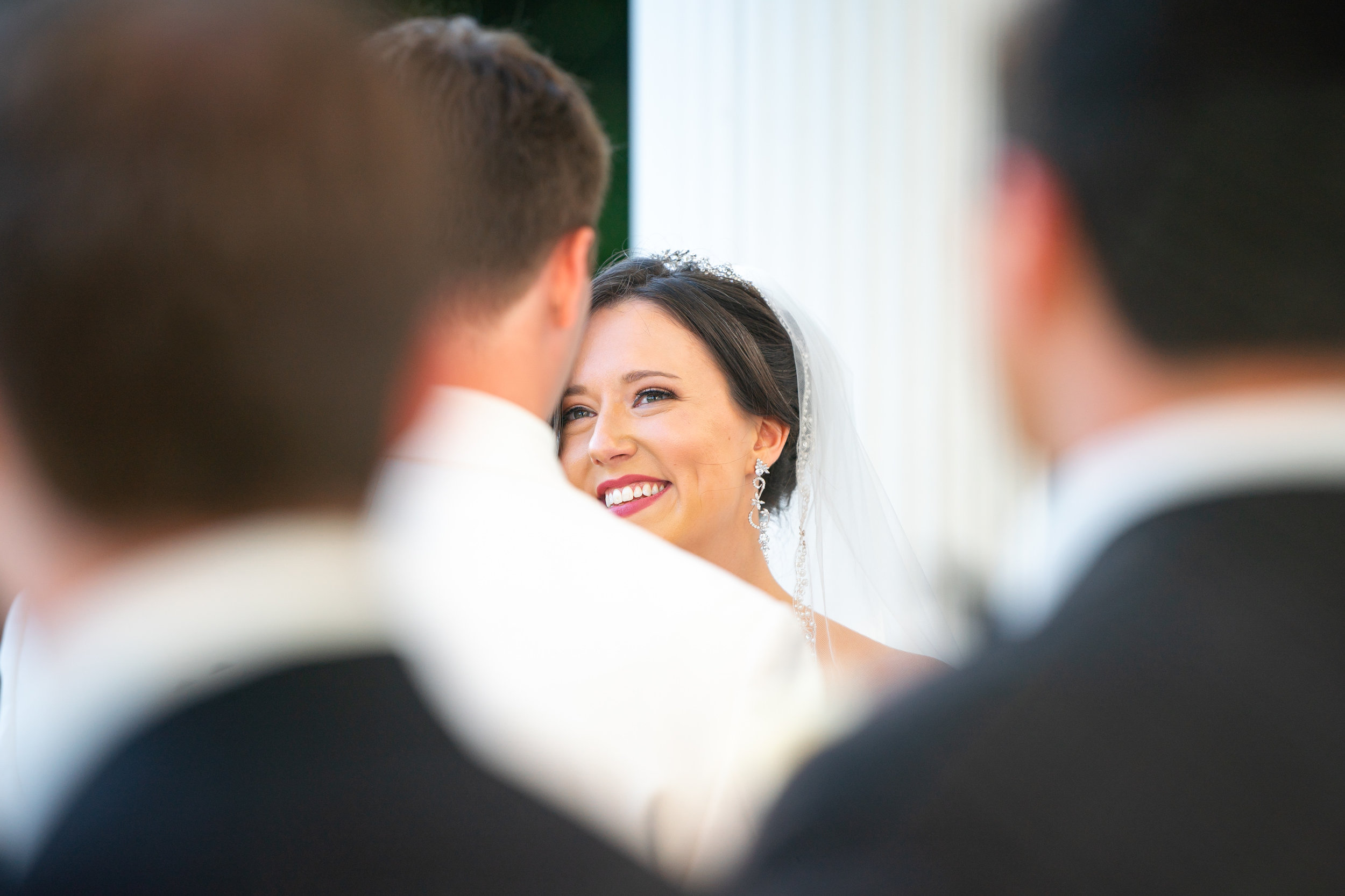 Bride looking at groom at Harvest House at Lost Creek Winery wedding