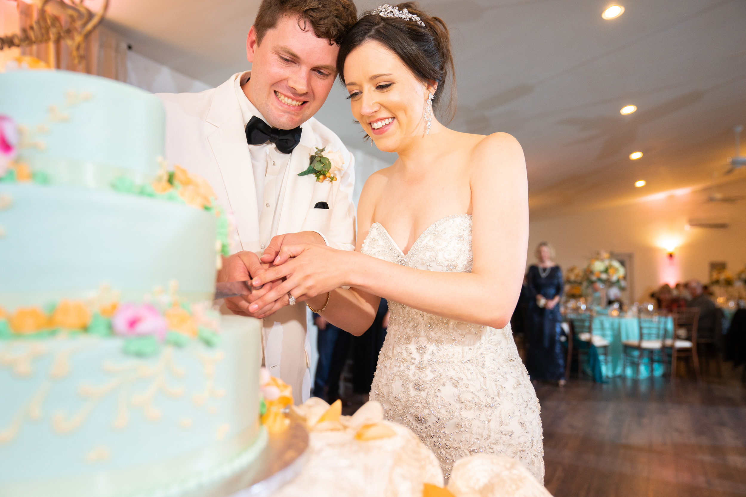 Cake cutting at Harvest House at Lost Creek Winery wedding