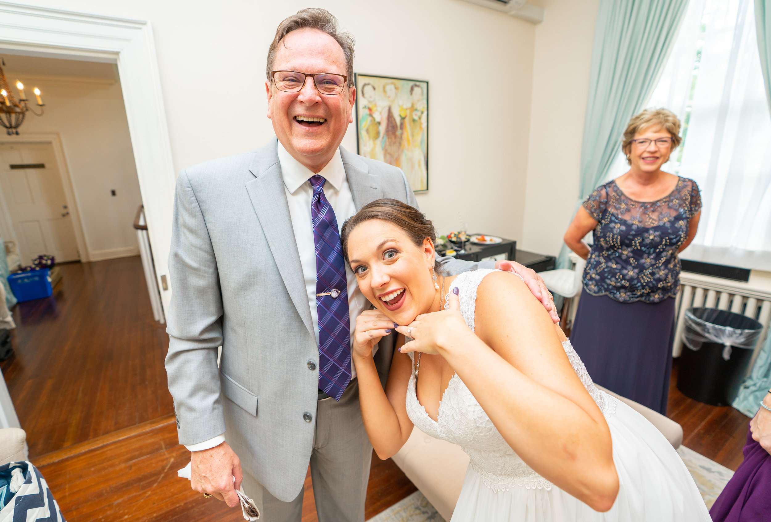 Bride and her dad at Rust Manor House bridal suite posing 