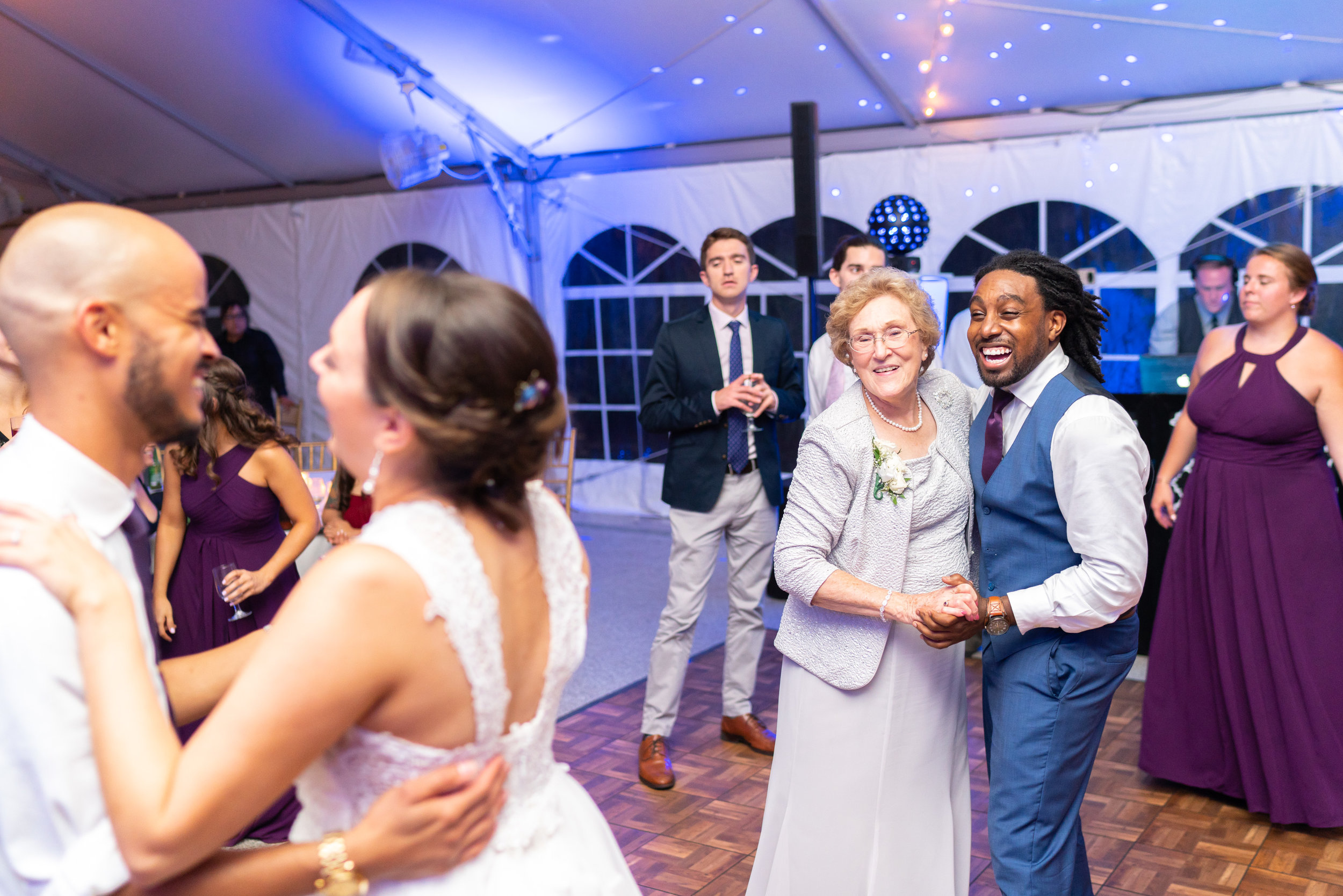 Guests dancing with bride and groom at Rust Manor House