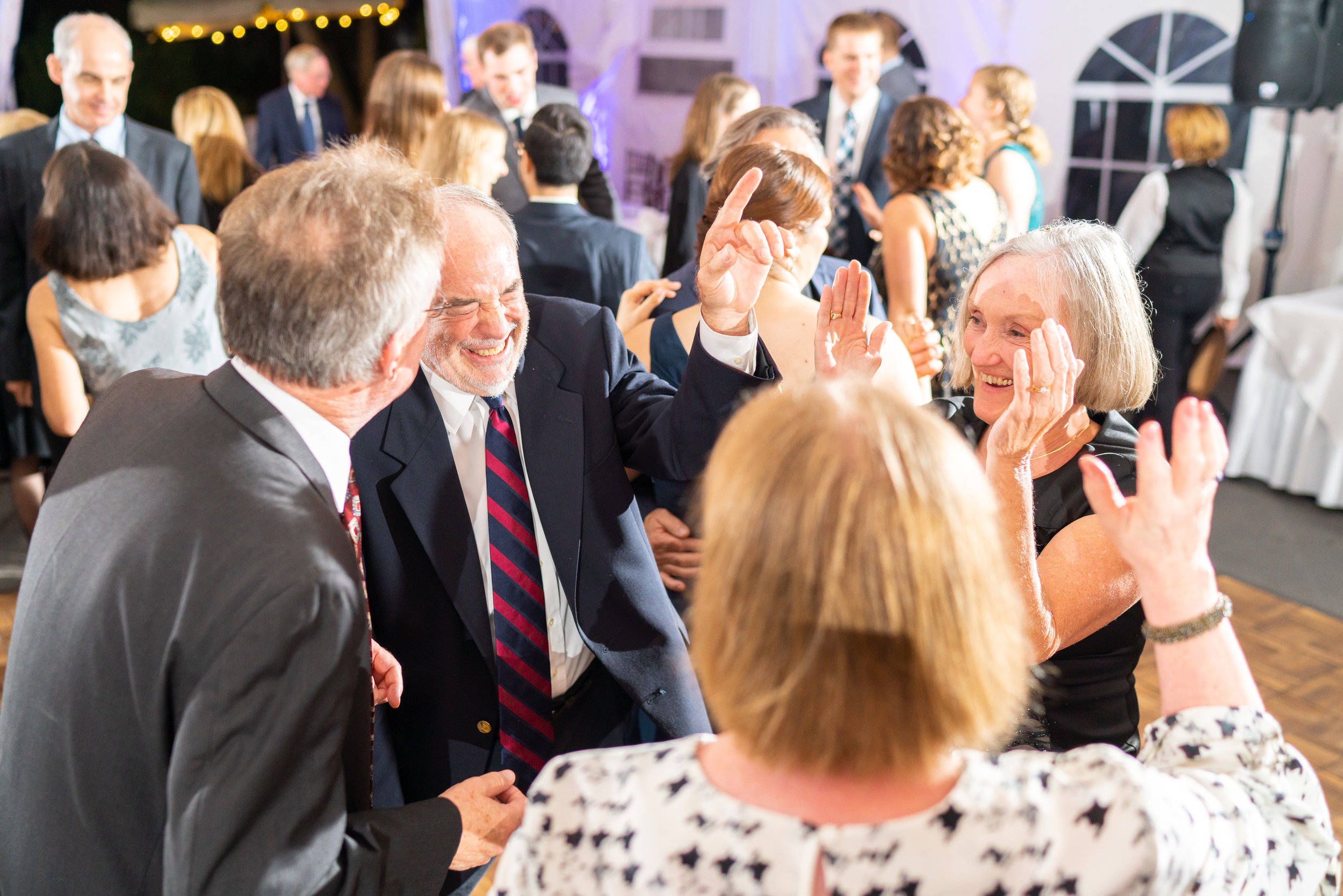 Family dancing during wedding reception at Elkridge Furnace Inn
