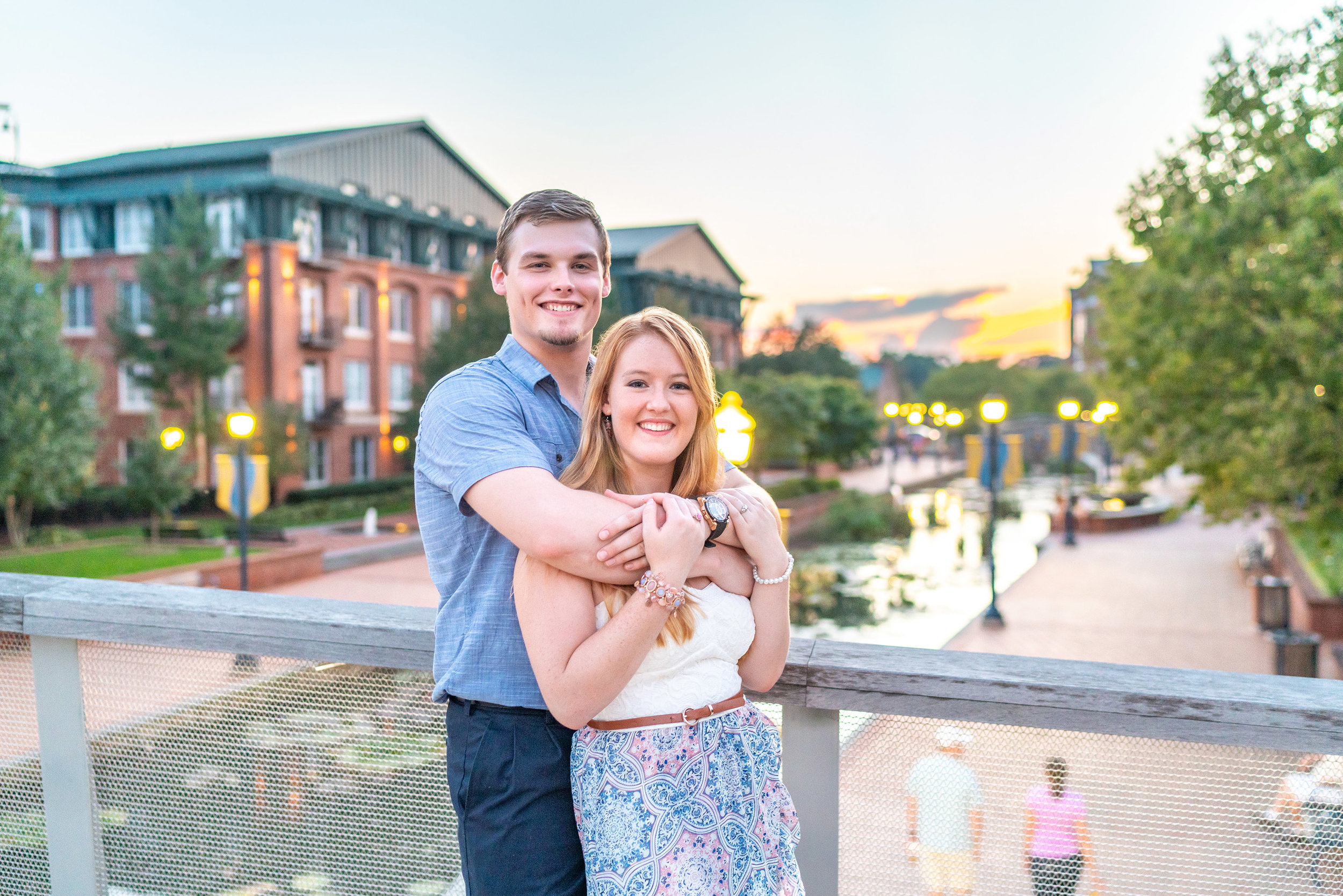 Bride and groom at sunset engagement photo session downtown Frederick riverwalk