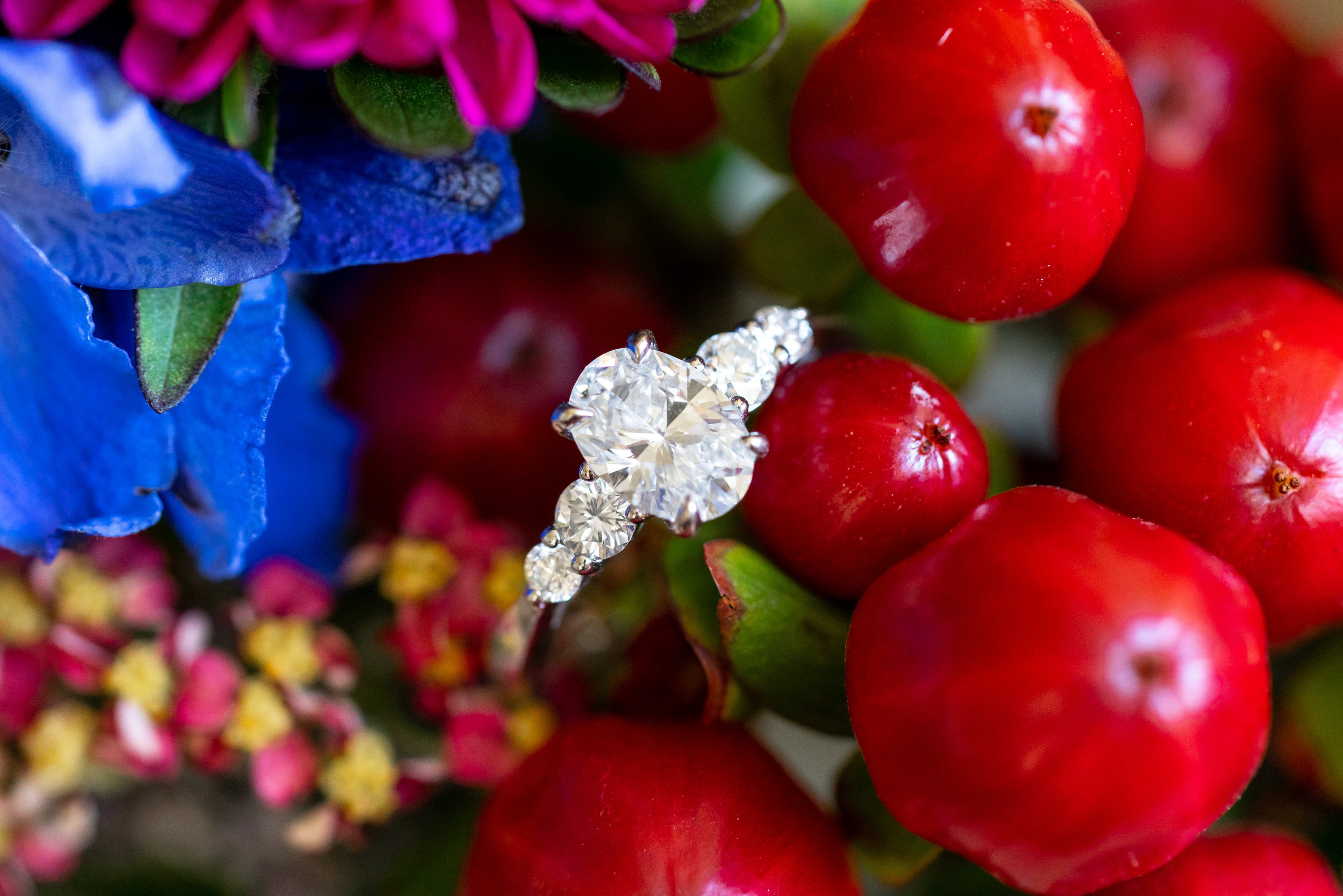 Boone and Son's oval three stone engagement ring in winter bouquet by Blossom and Basket Boutique
