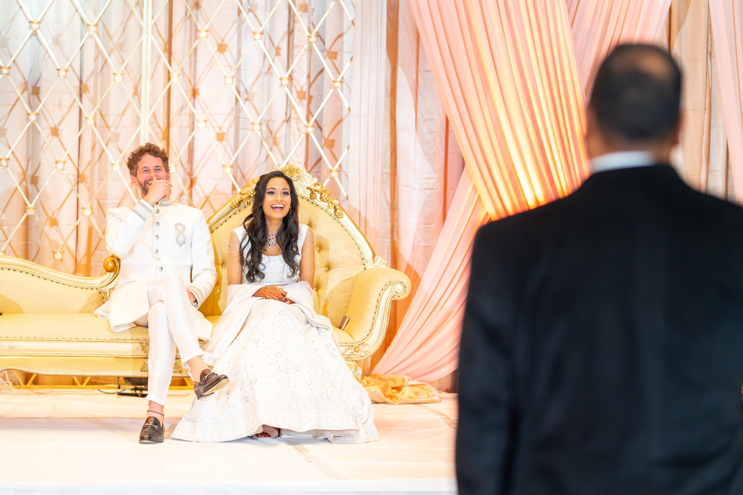 Bride's brother reading a funny toast in ballroom at bethesda north marriott