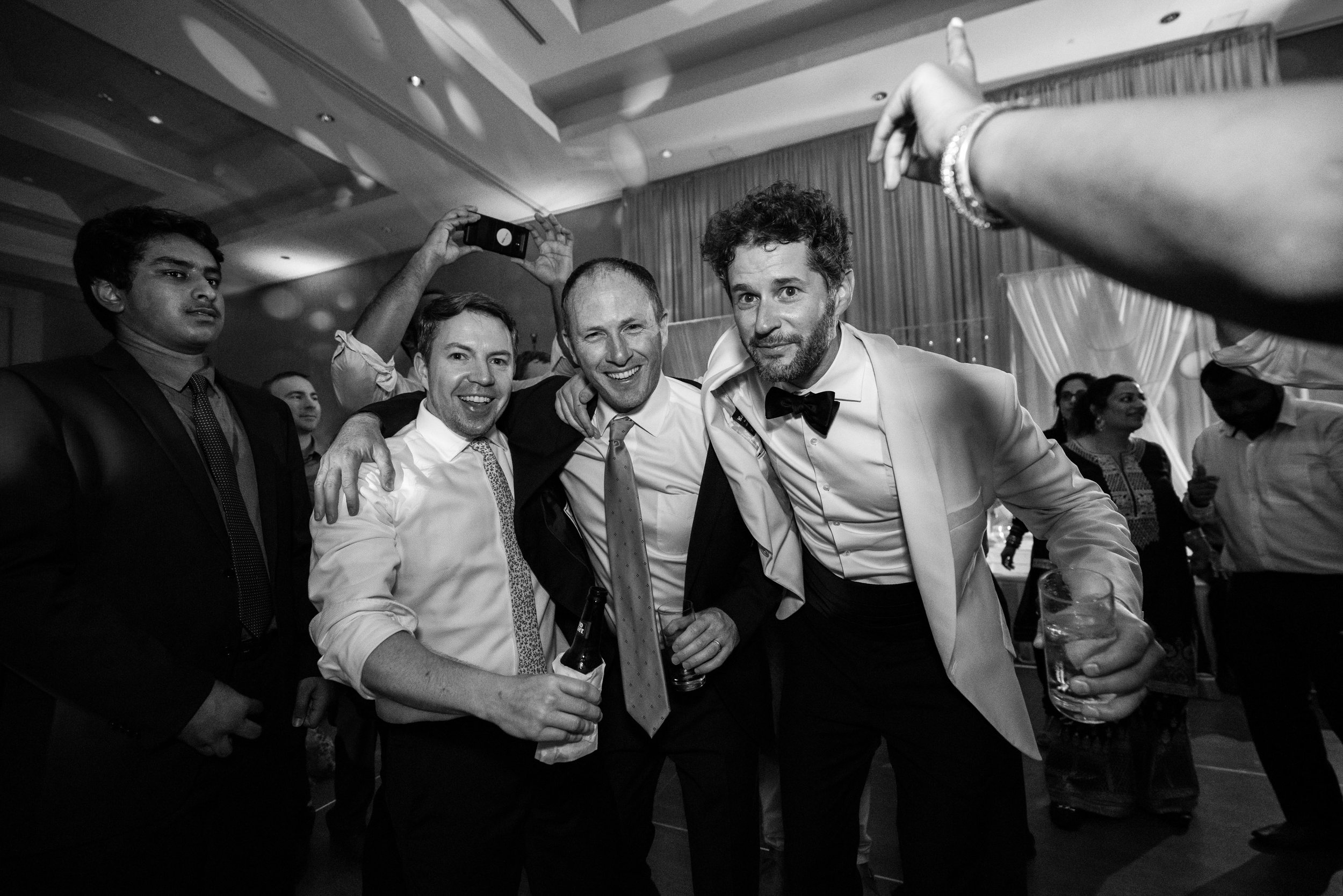 Groom and friends on the dance floor at bethesda north marriott wedding photos