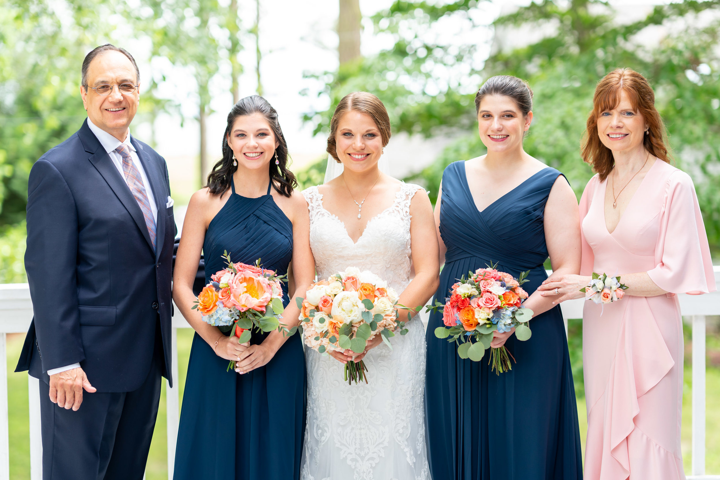 Bride and sisters and parents at Rehoboth Beach Country Club wedding