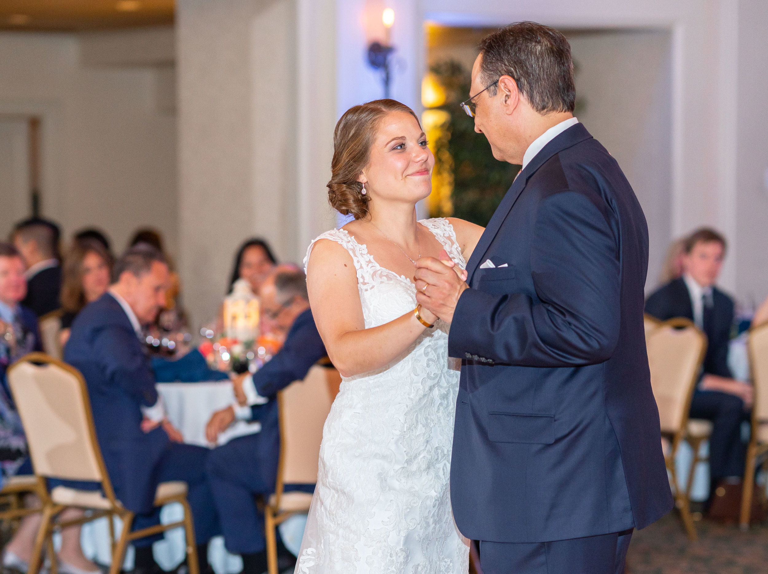 Father daughter dance in evening ballroom during wedding reception at Rehoboth Beach Country Club