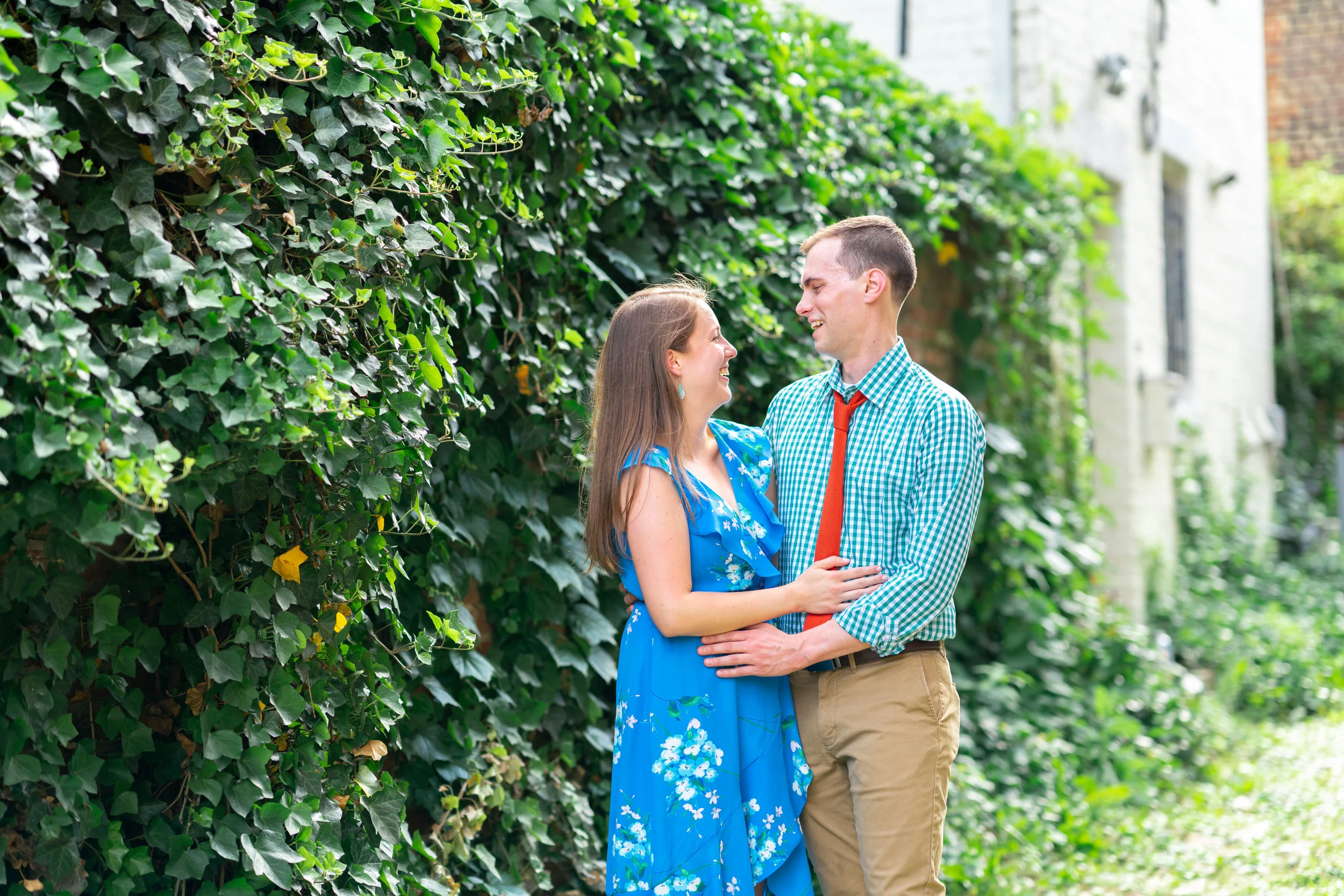 bride and groom hugging in cobblestone alley in old town alexandria