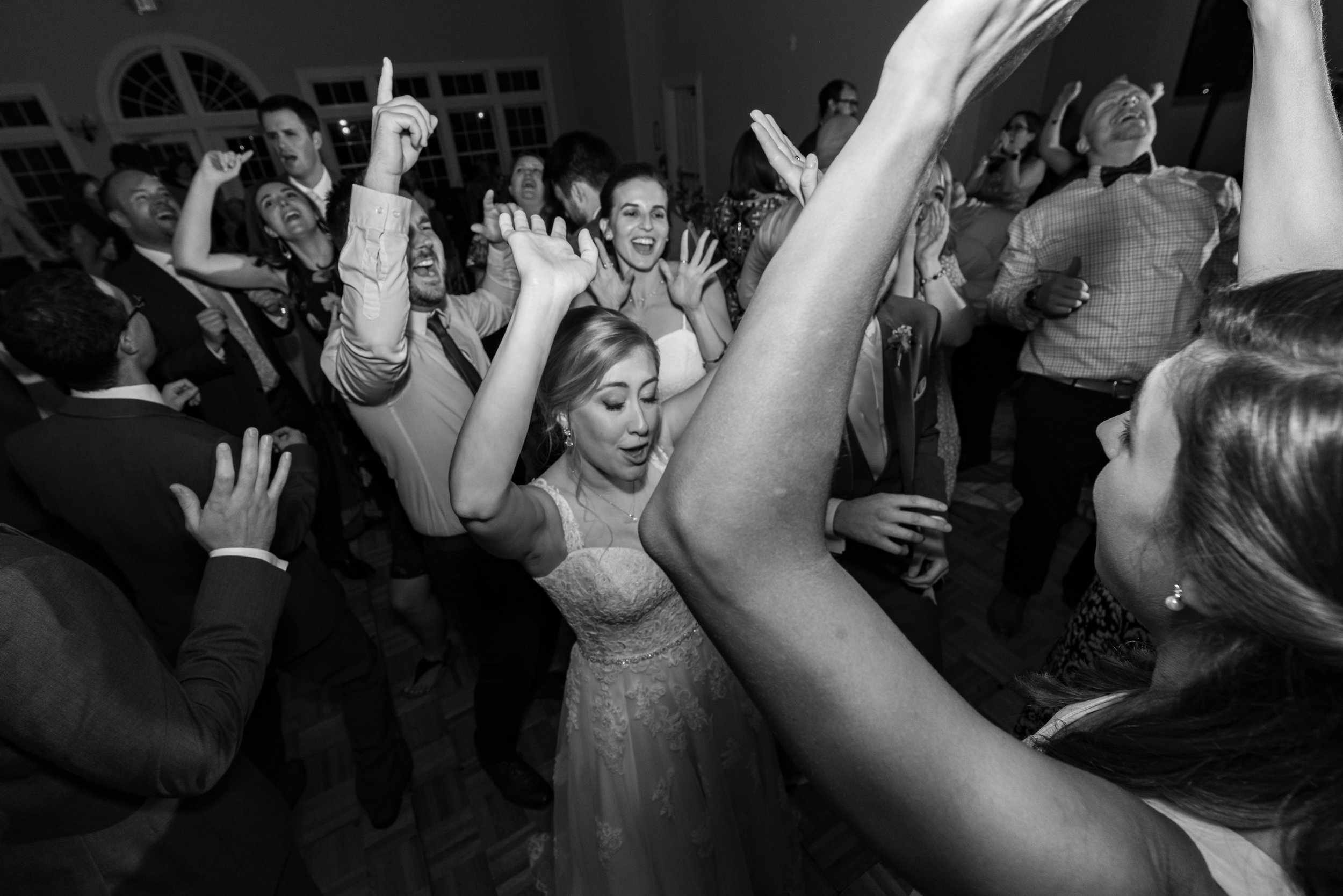 bride dancing during wedding reception 