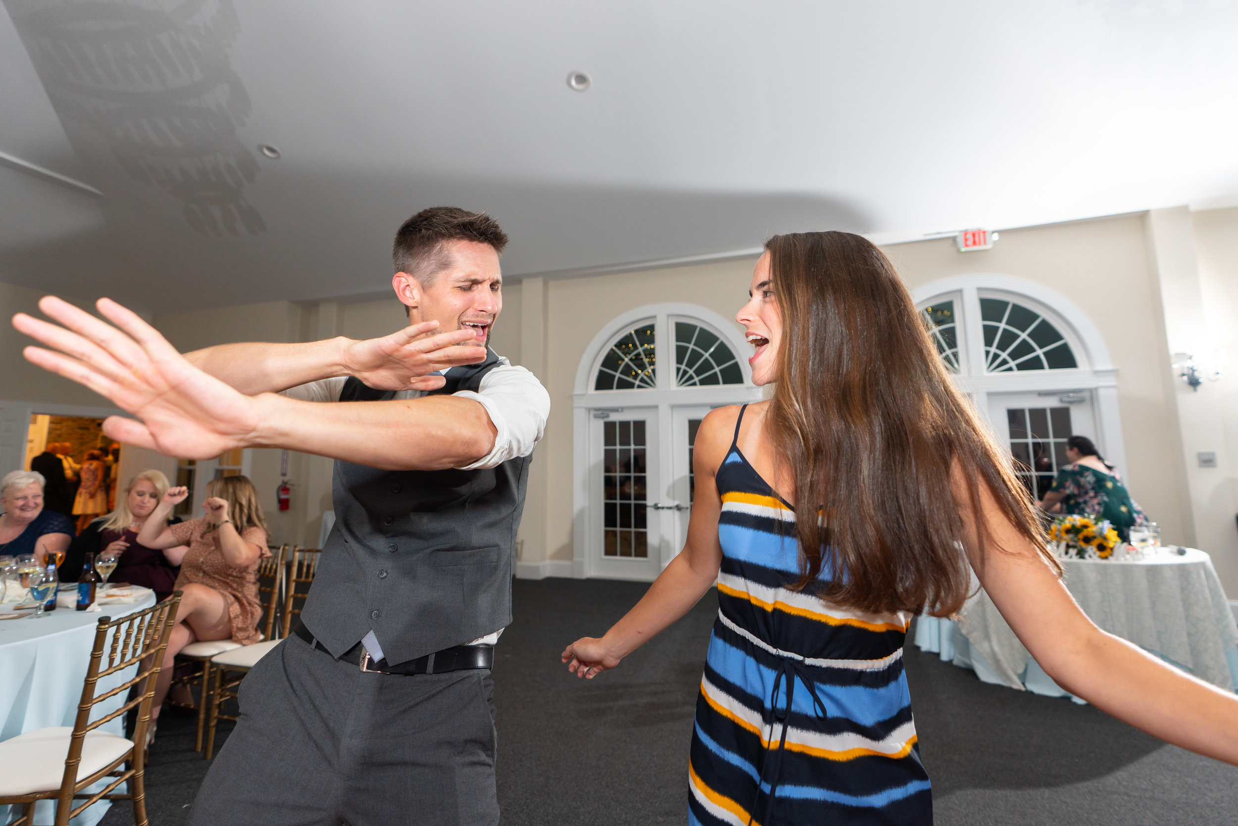 Two guests dancing with DJ Jake Sherman at stone manor