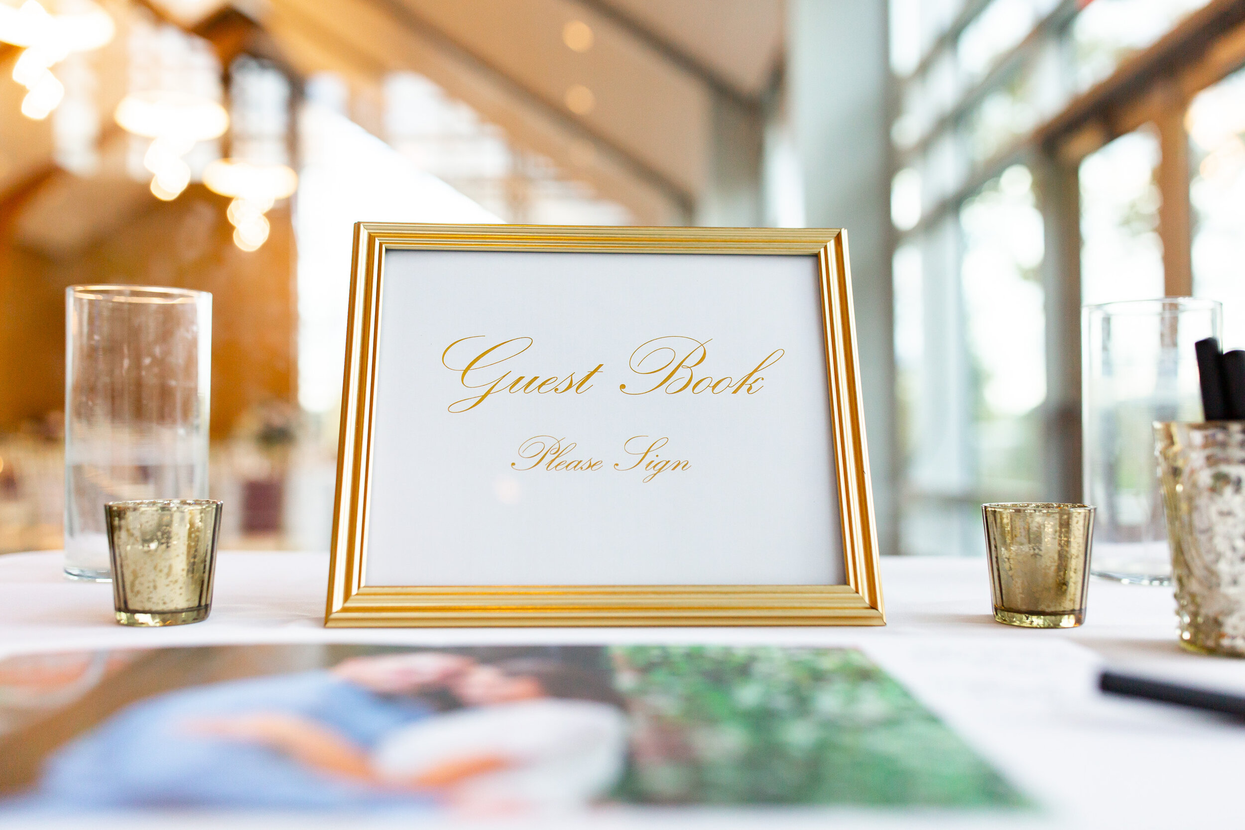 Gold guest book and sign at Riverview at Occoquan 