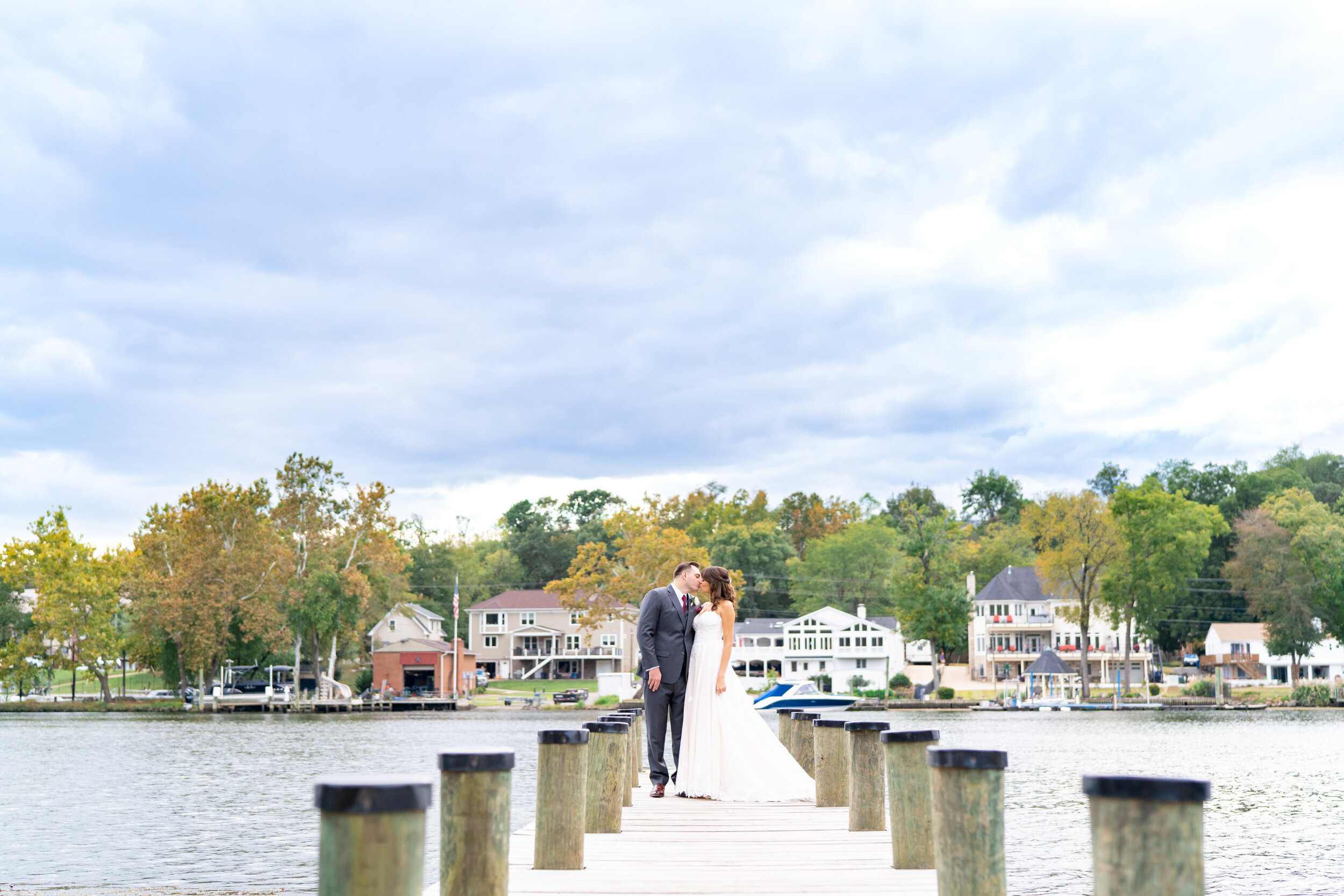 Bride and groom on the dock at Riverview at Occoquan