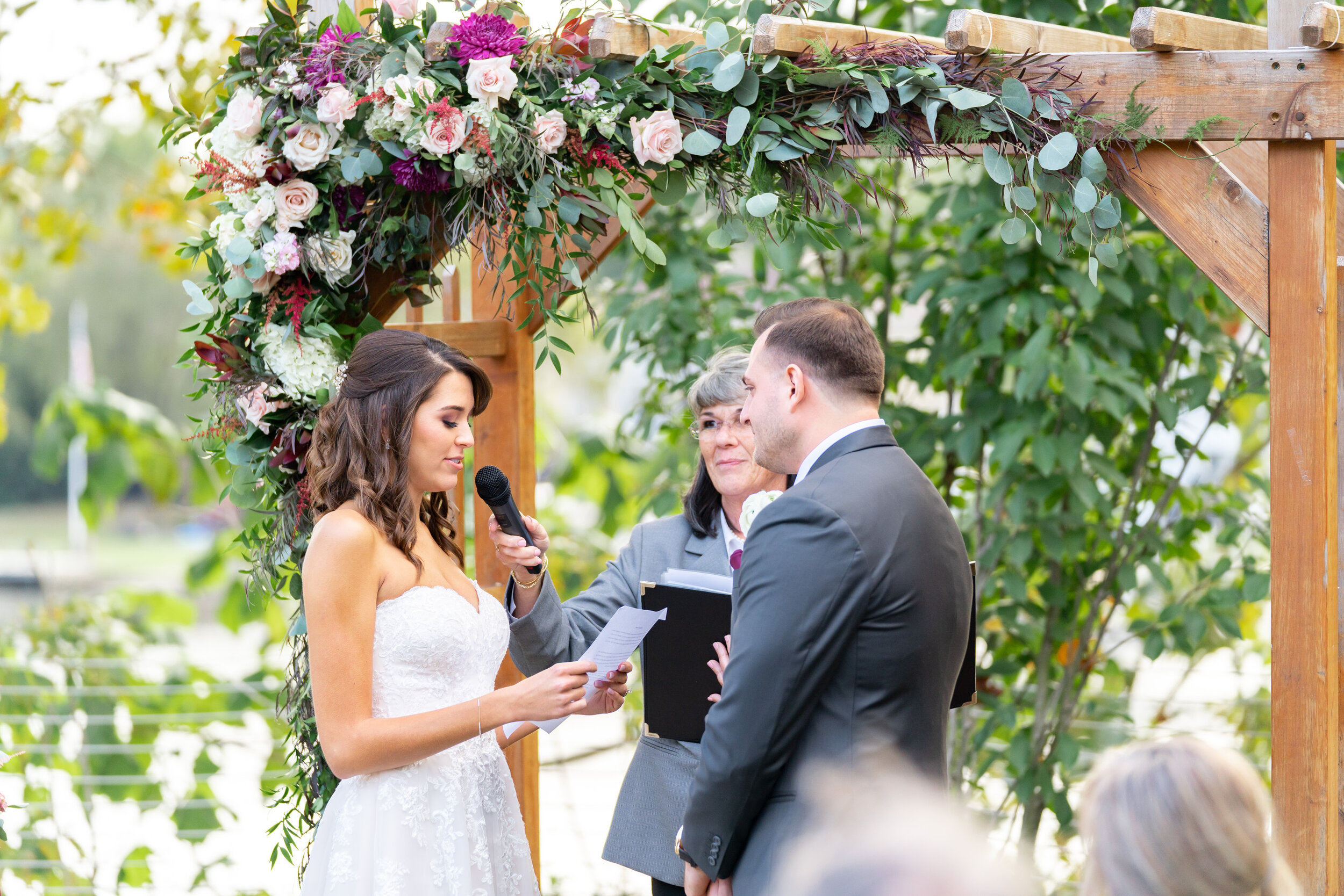 Bride and groom fall wedding ceremony at Riverview at Occoquan