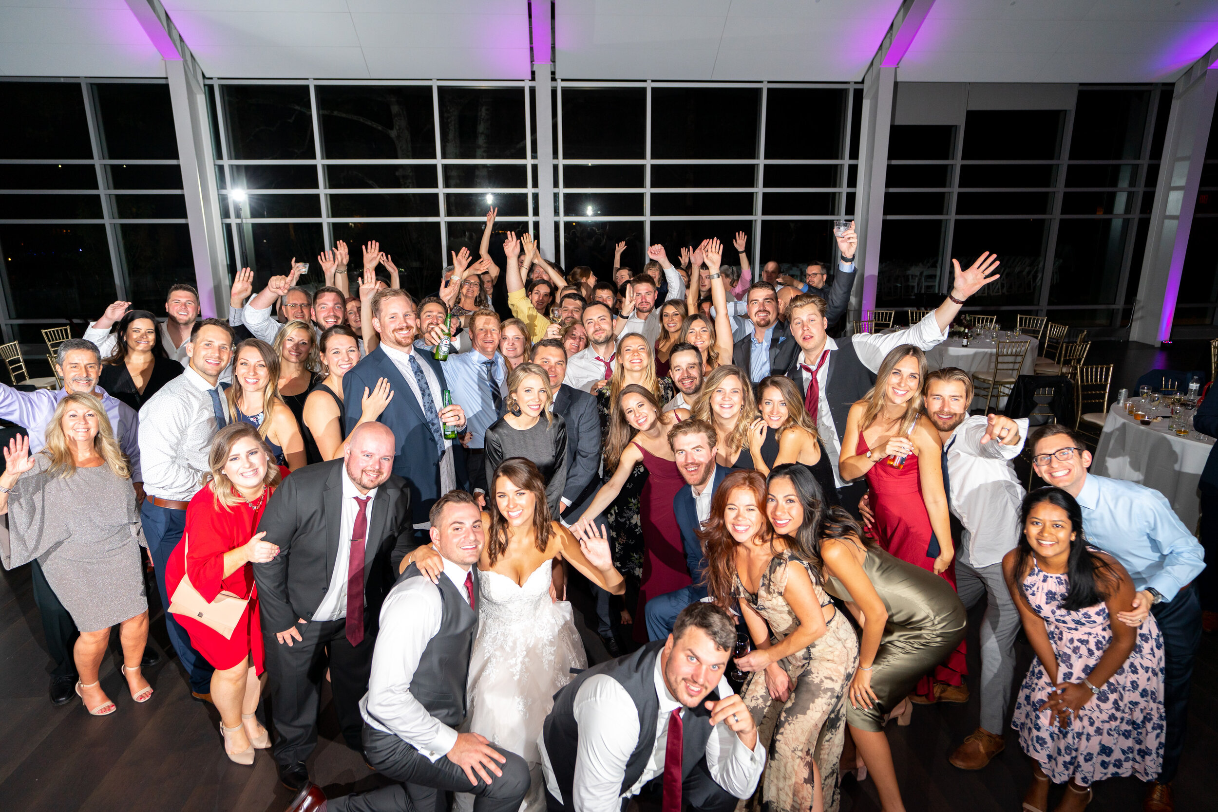 All of the guests have a group photo at the end of the night on the dance floor