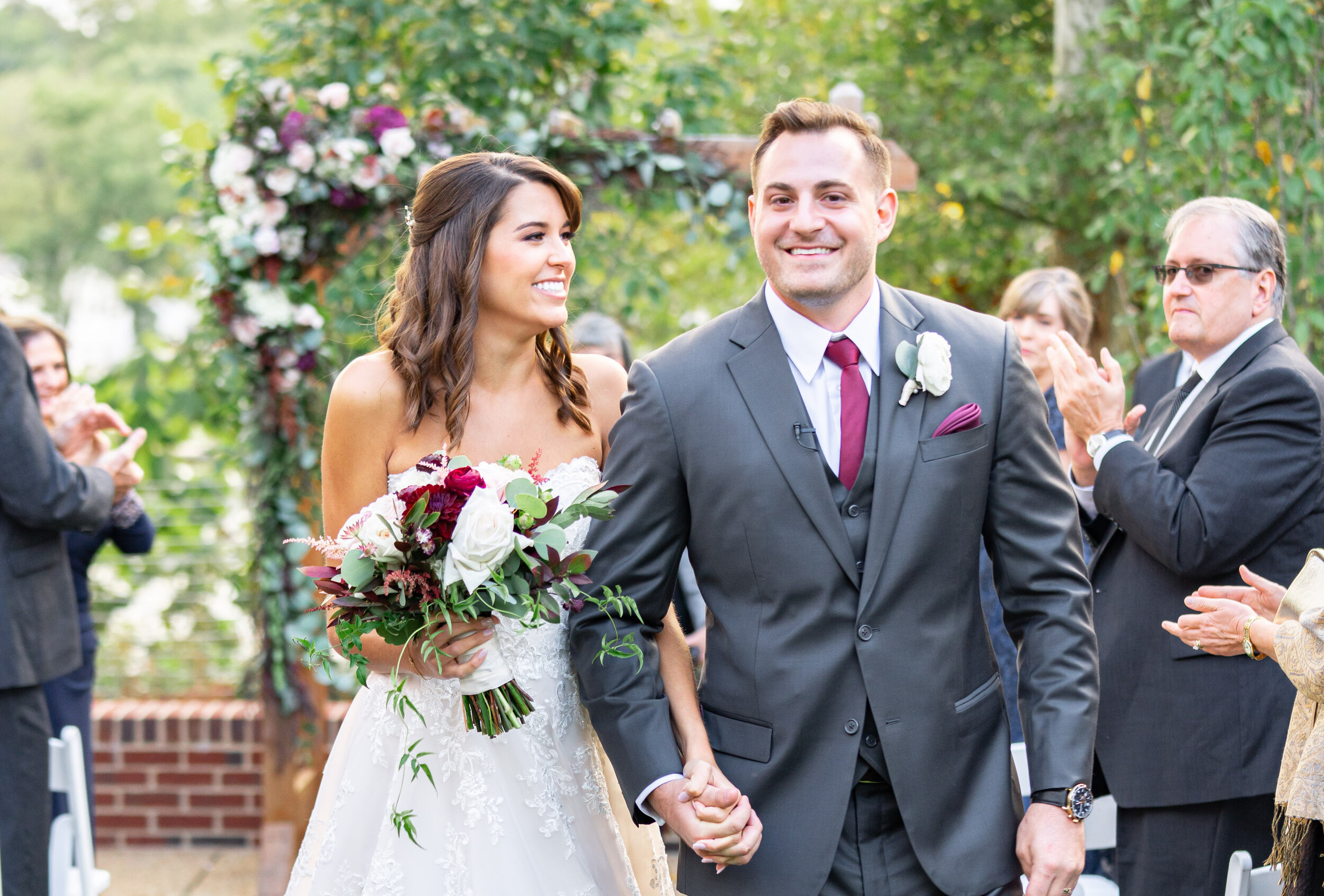 Bride and groom walking down the aisle at Riverview at Occoquan