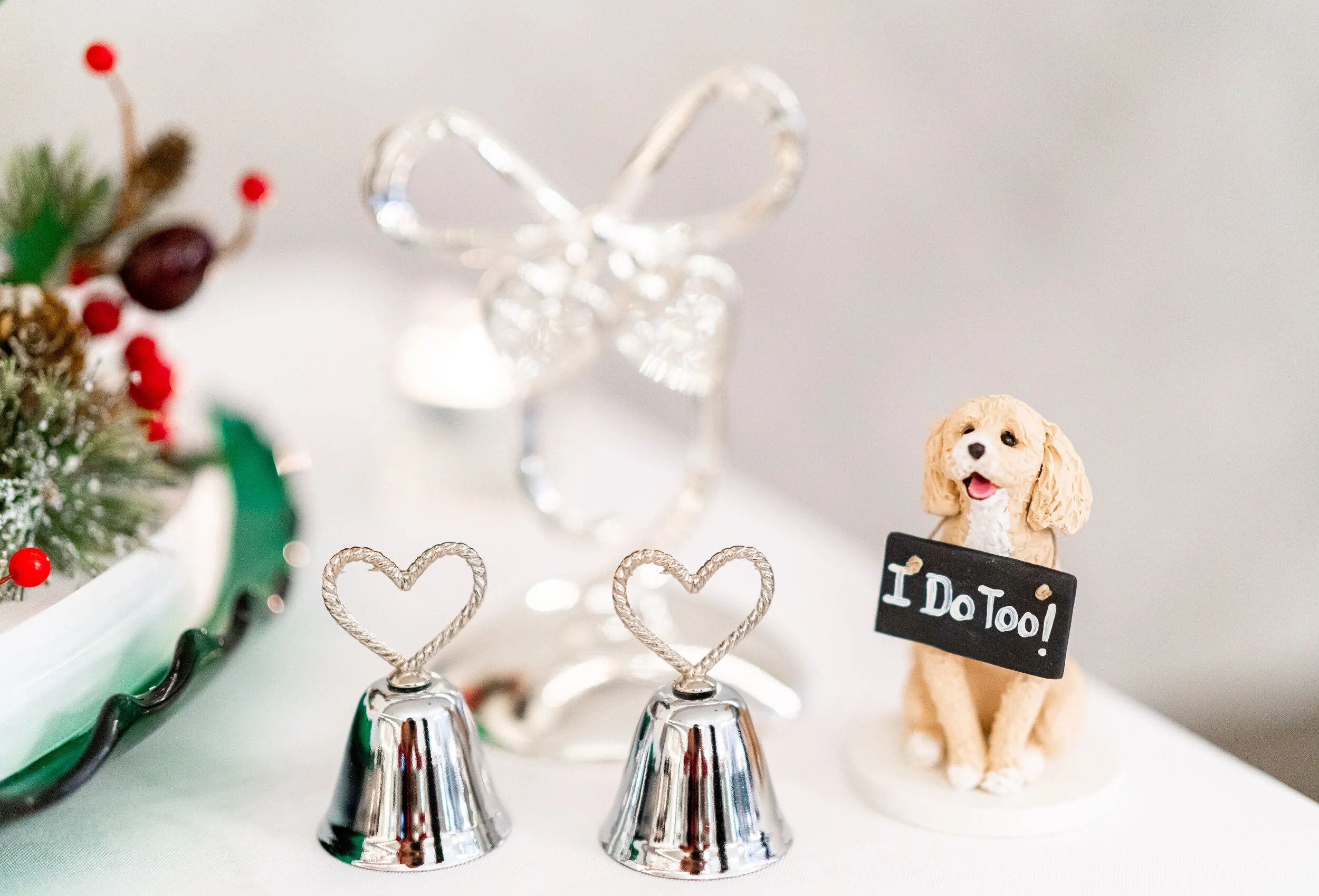 Puppy I do too cake topper with silver bells at christmas wedding