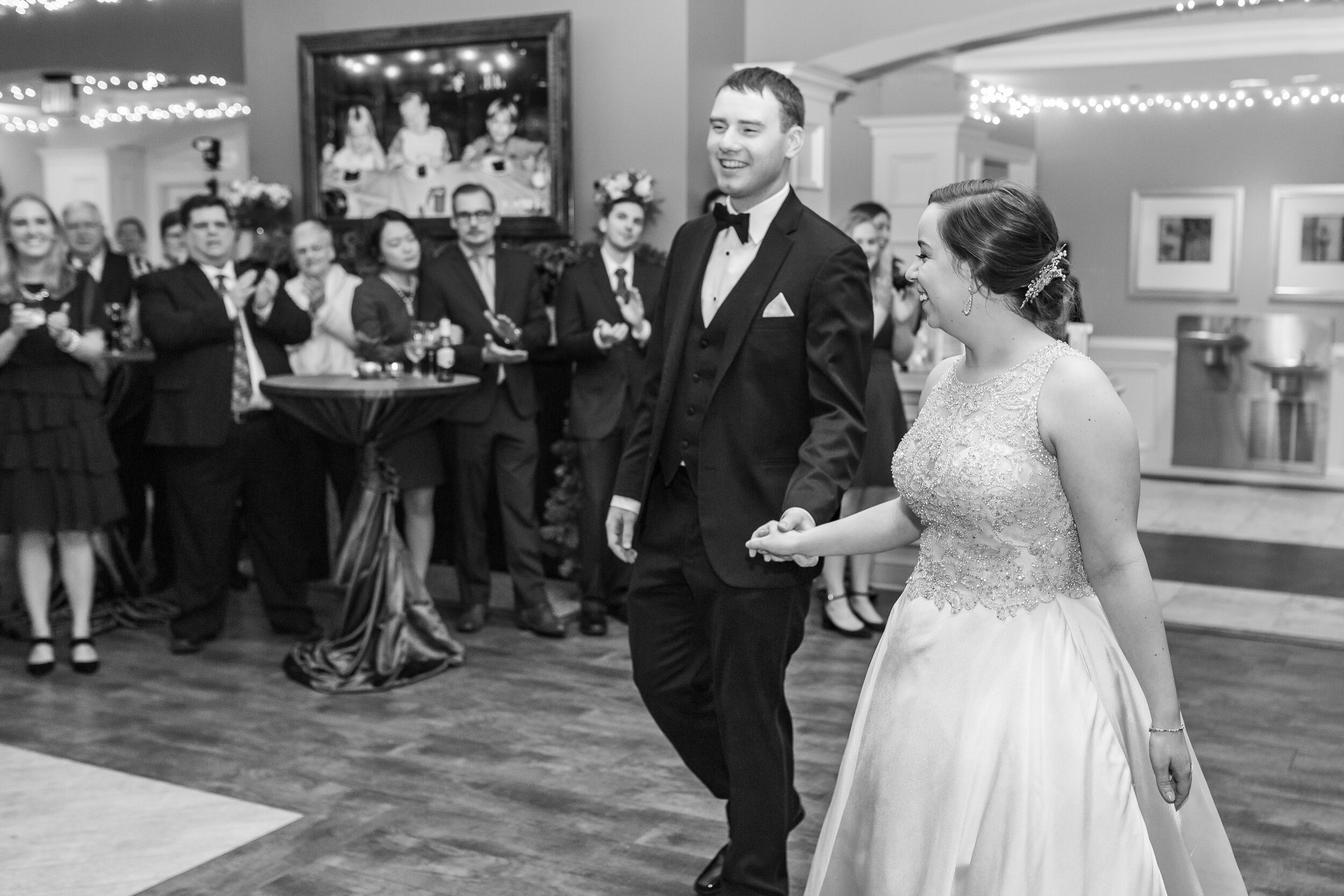 Grand entrance with bride and groom at ospreys belmont bay