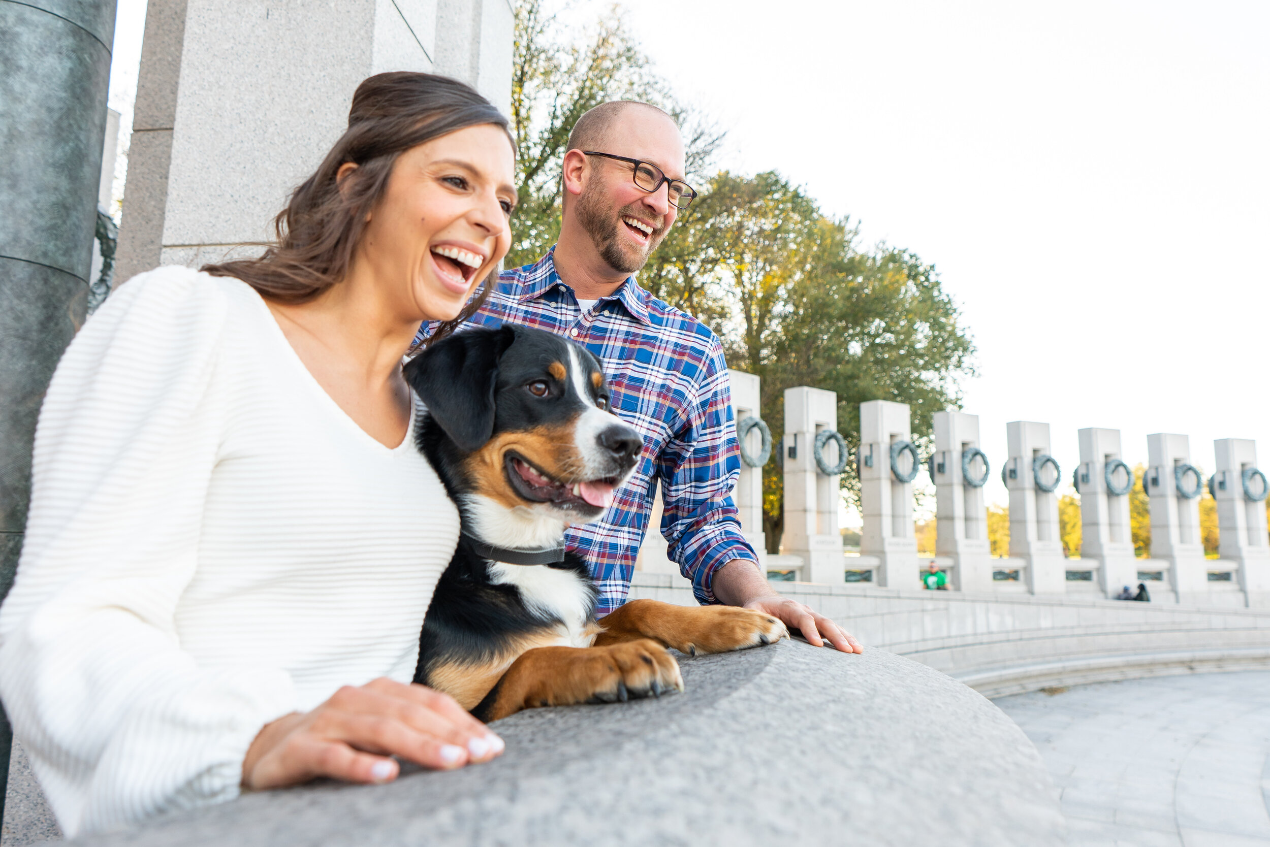 Bride, groom and dog at the WWII Memorial