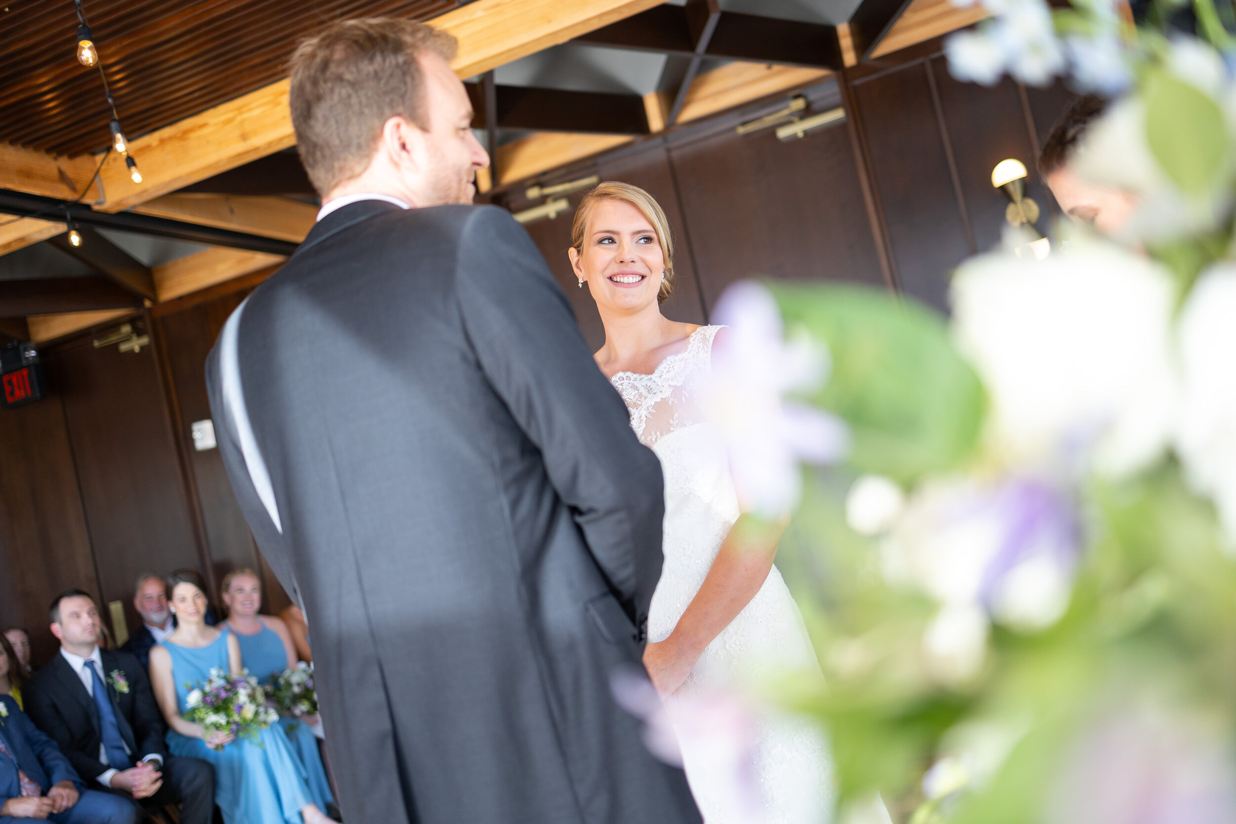 Bride smiles during vows at District Winery