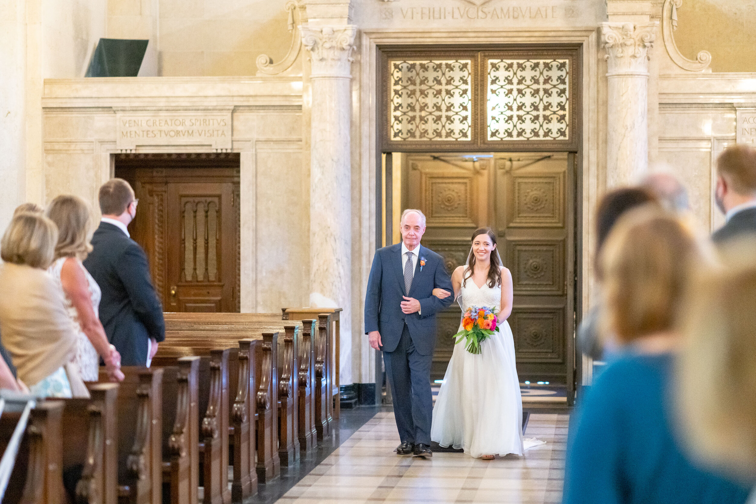 Bride and her father walking down the aisle at chapel at Georgetown Prep