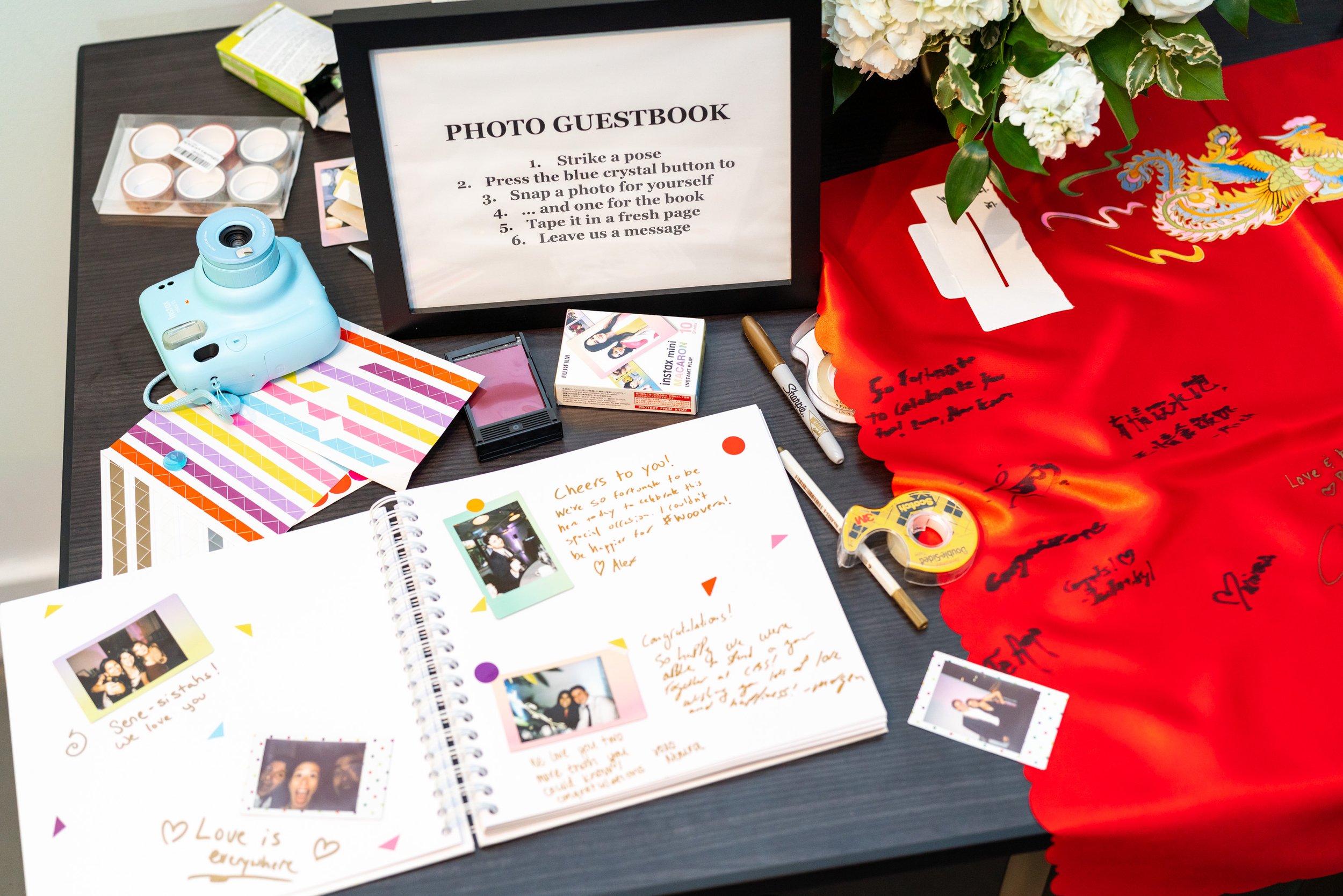 Colorful guest book with polaroid at Chinese Cuban fusion wedding