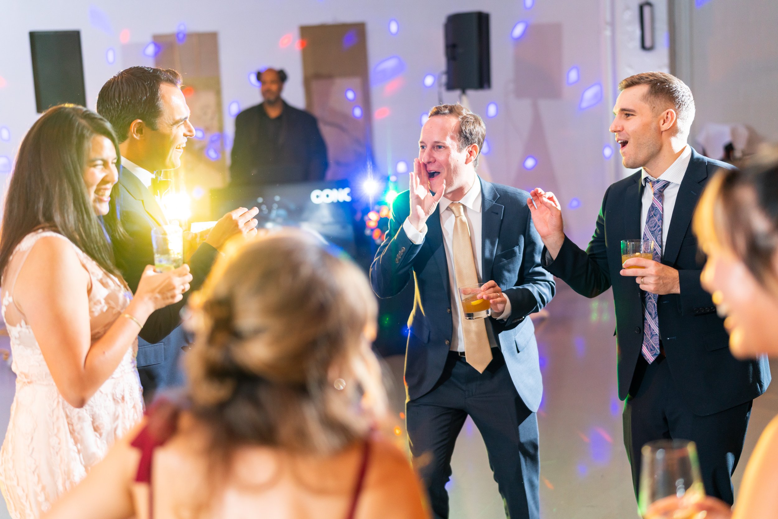Fun lighting and color at wedding reception dance floor