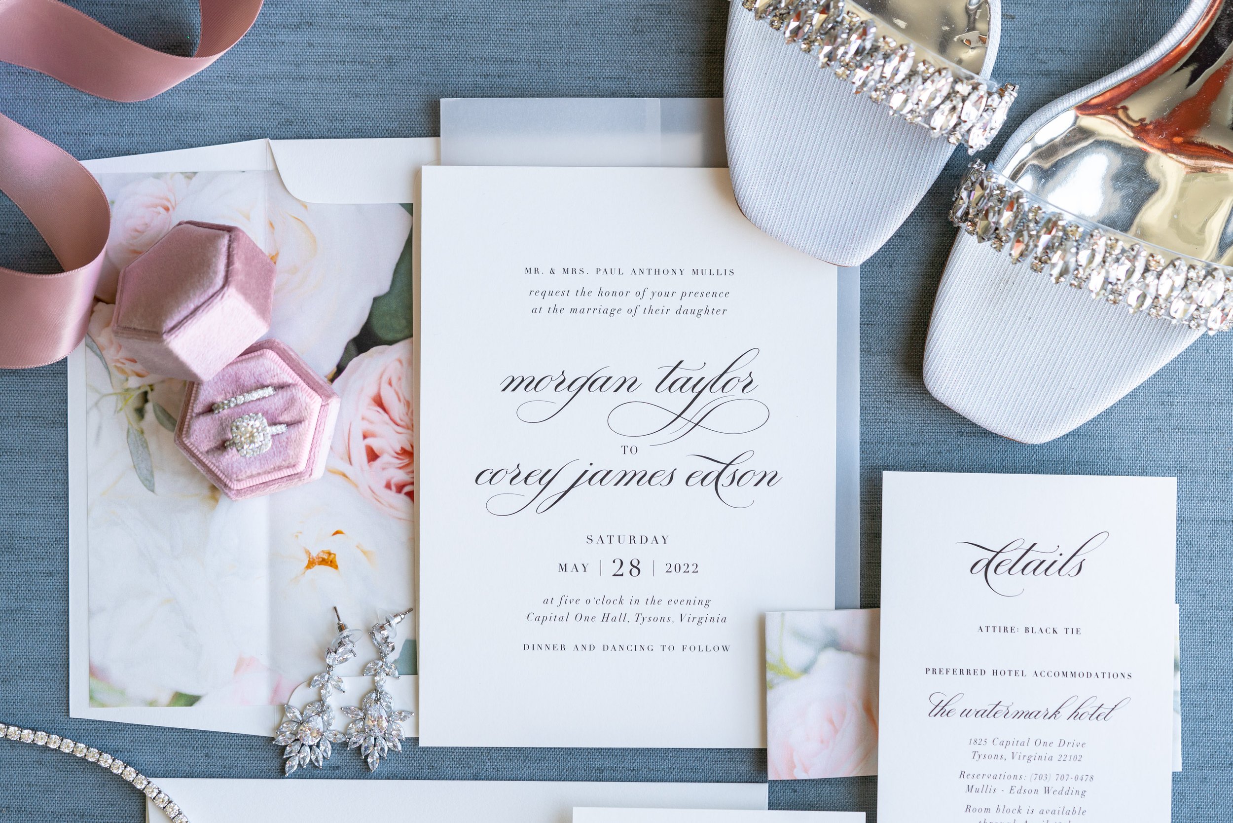 Invitation flat lay image with blue background 
