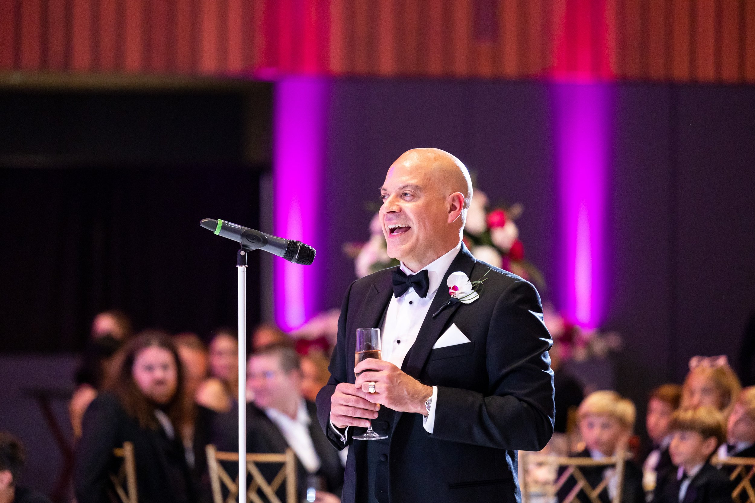 Father of the bride gives funny wedding speech to couple at wedding reception