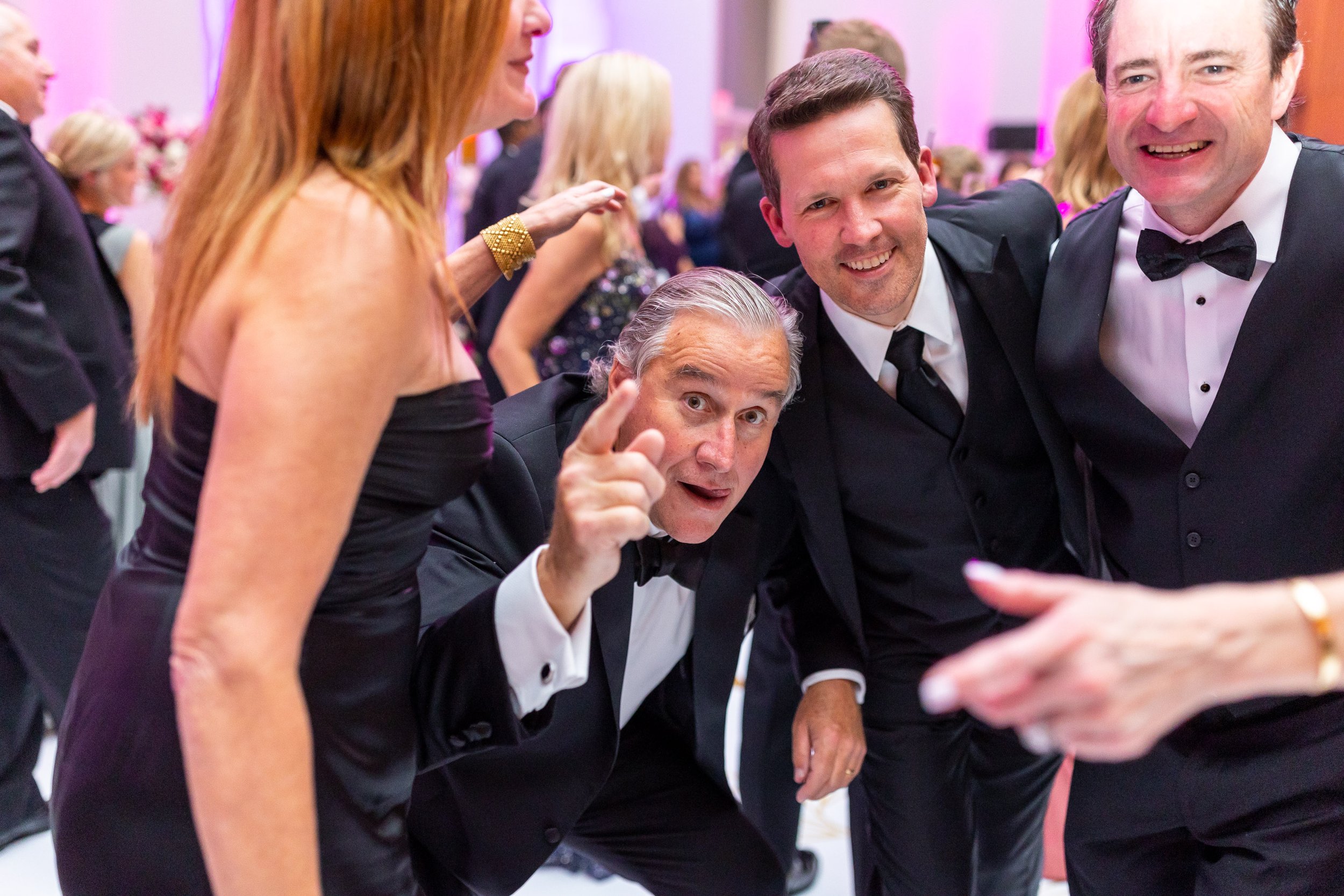 Funny and candid wedding guest photos at Capital One Hall 