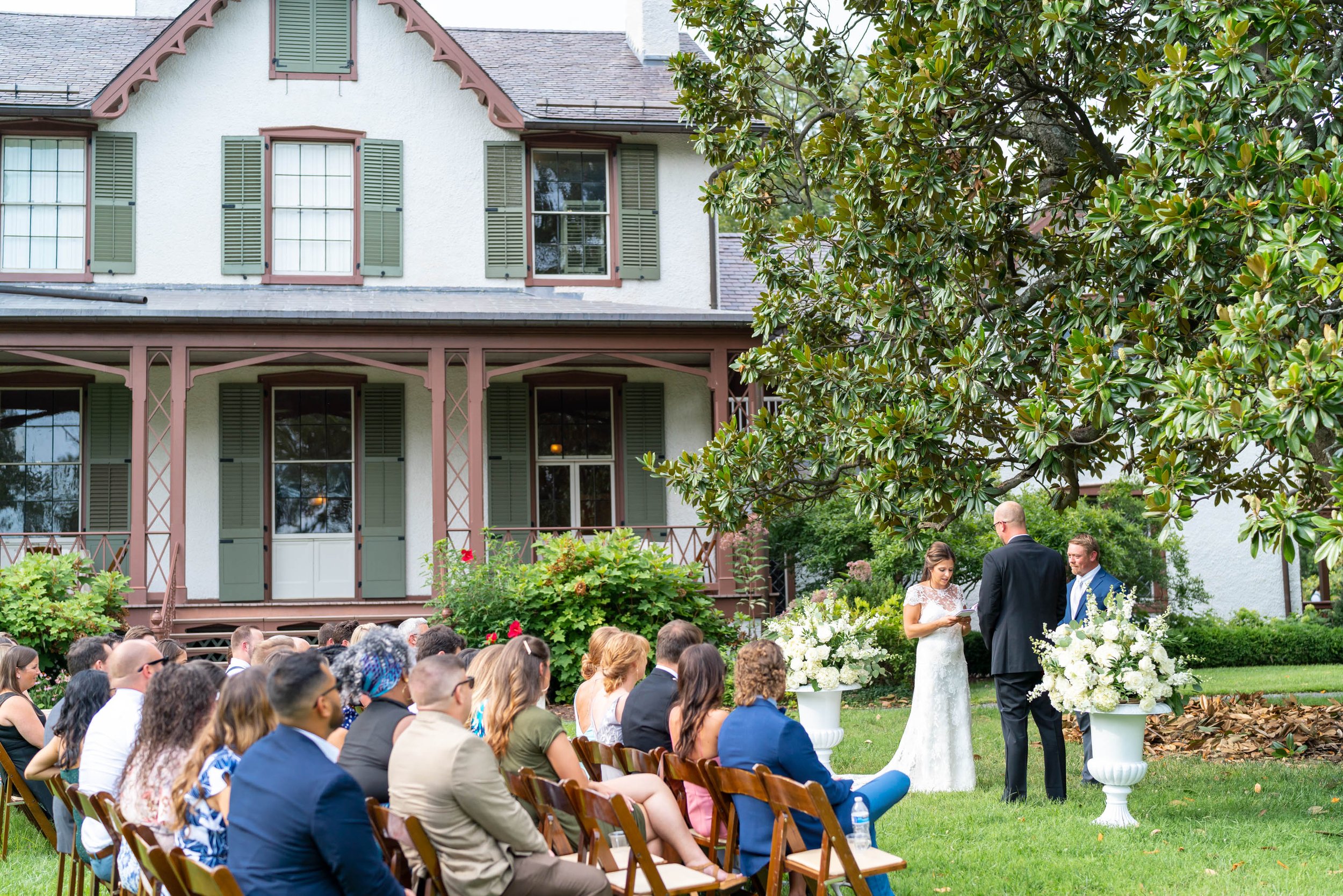 Wedding ceremony photos outside at President Lincolns Cottage lawn 
