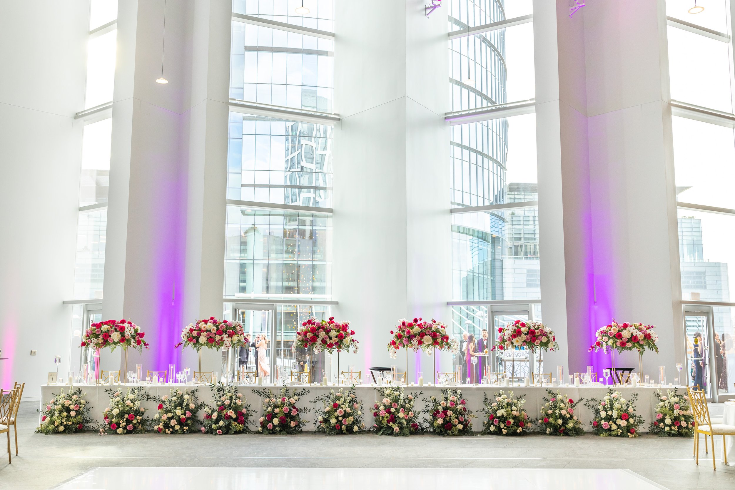 Head table for bridesmaids and groomsmen to join bride and groom during wedding reception