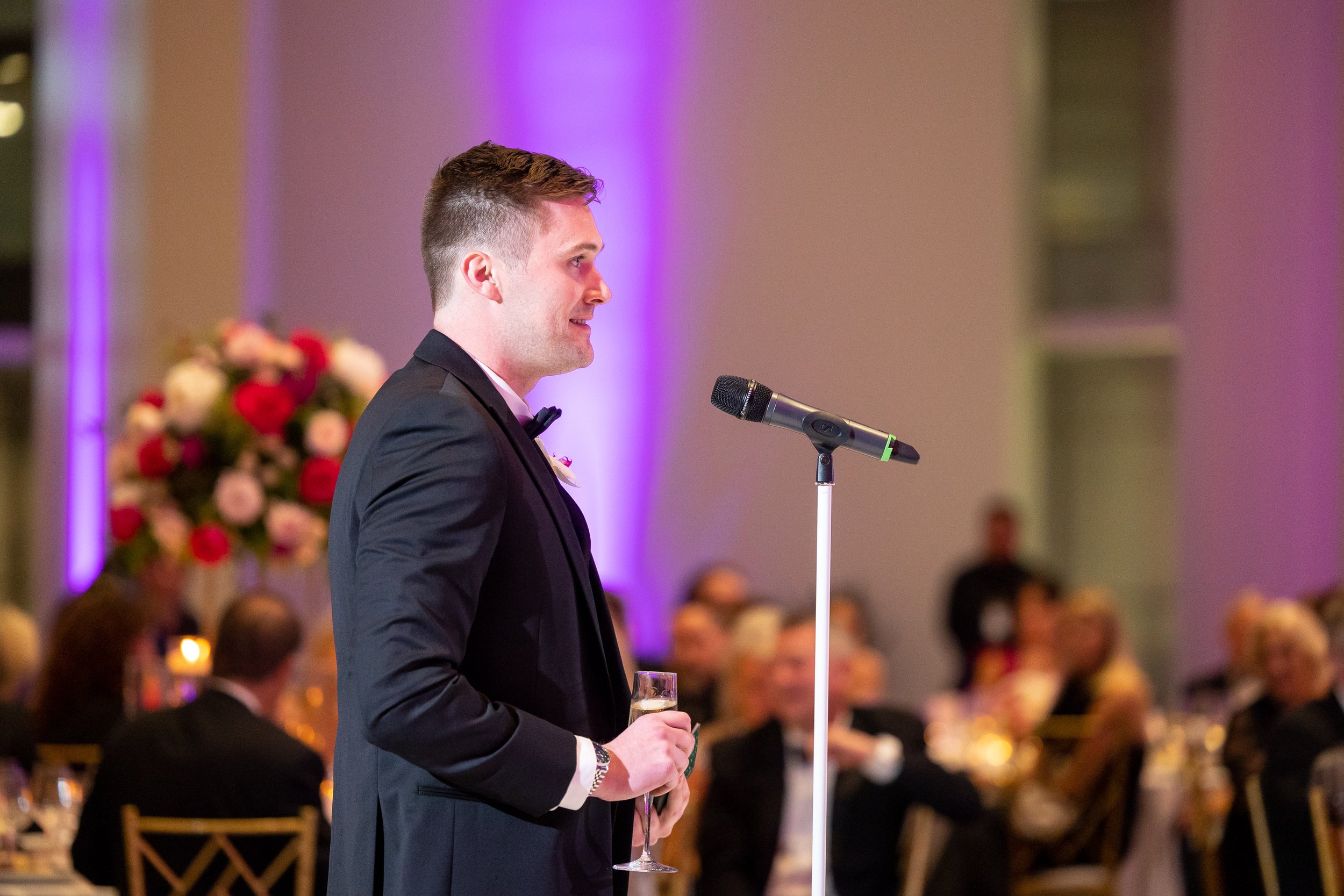 Best man gives funny and heartwarming speech in colorful reception hall