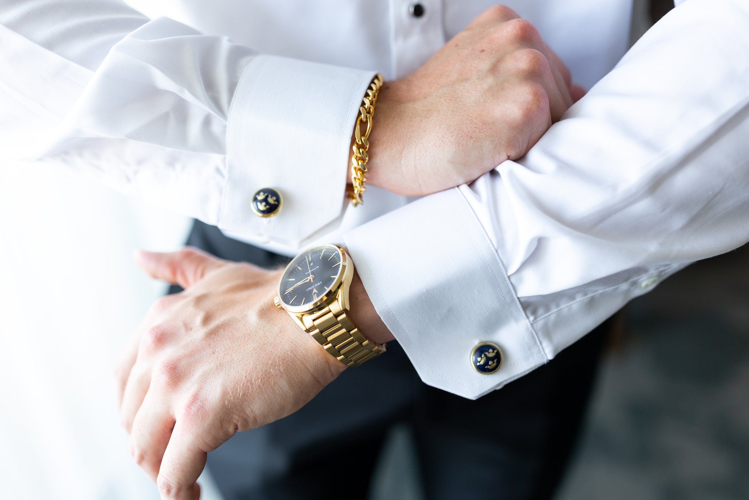 Groom's cufflinks and watch during getting ready photos 