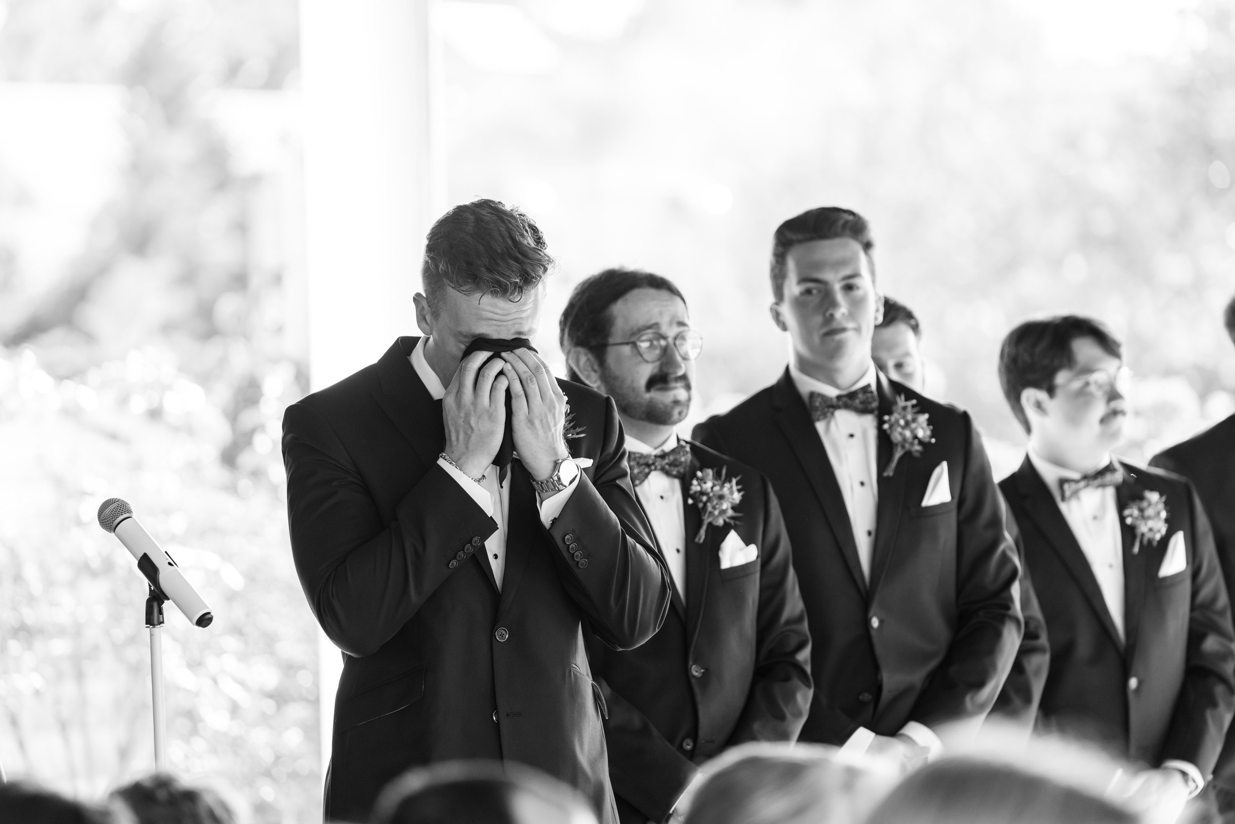 Groom crying watching bride walk down the aisle at Hyatt Chesapeake