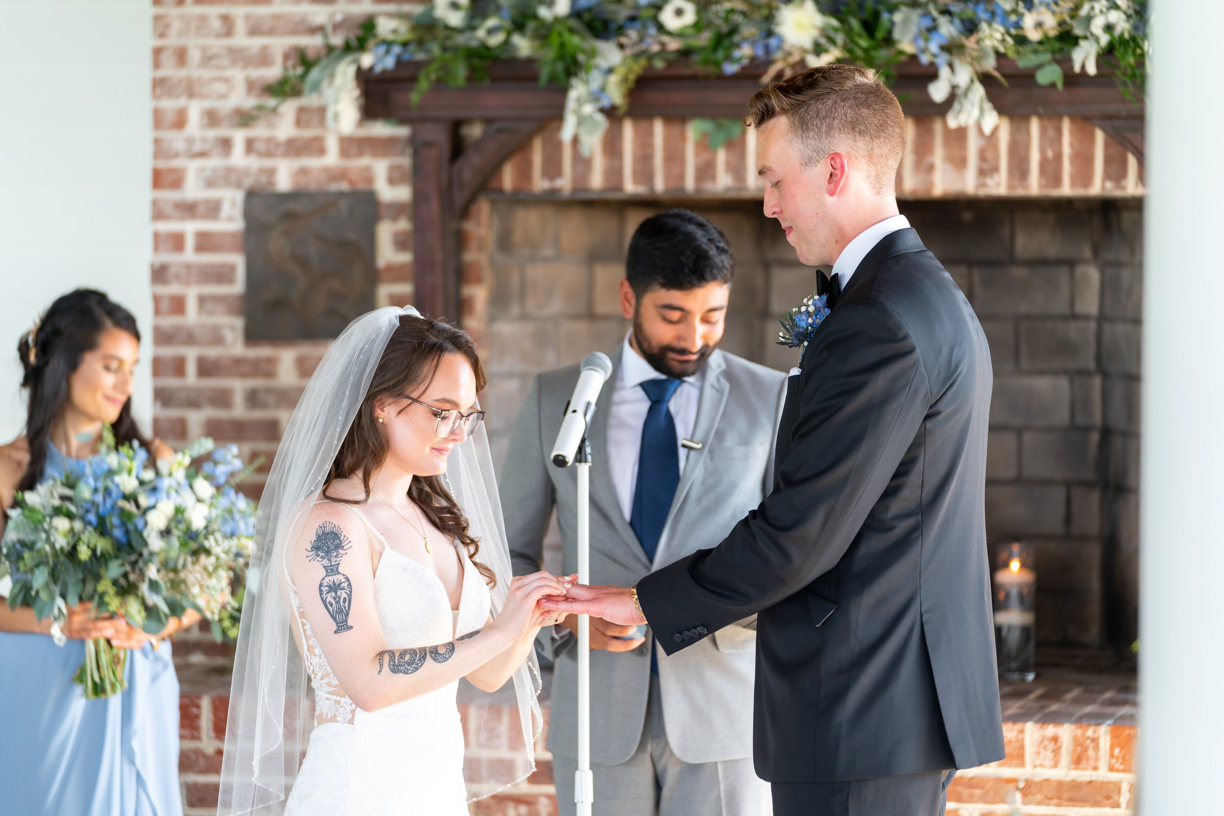 Bride puts ring on groom's finger at Hyatt Chesapeake maryland wedding