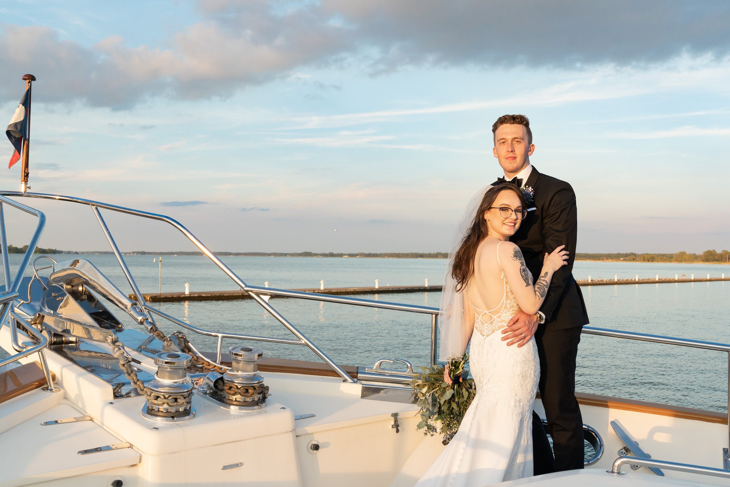 bride and groom wedding portraits on yacht in Annapolis Hyatt Chesapeake wedding