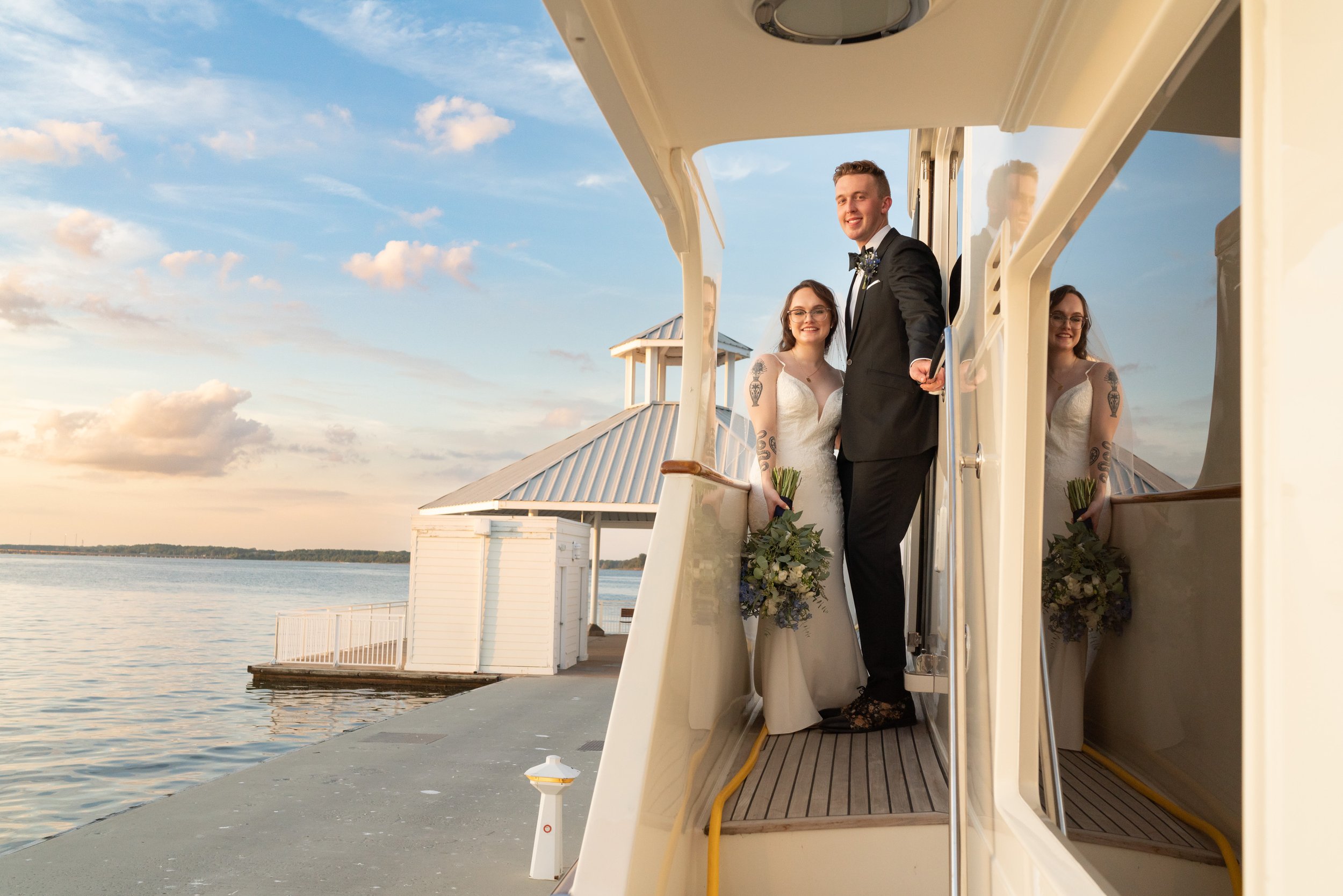 Bride and groom on yacht in Annapolis md during wedding photos at Hyatt Regency Chesapeake