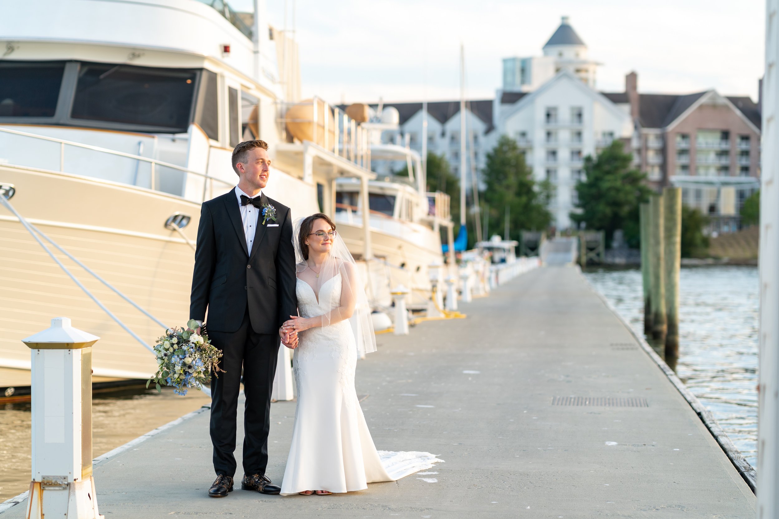 Romantic sunset bride and groom wedding portraits on the water in Annapolis md
