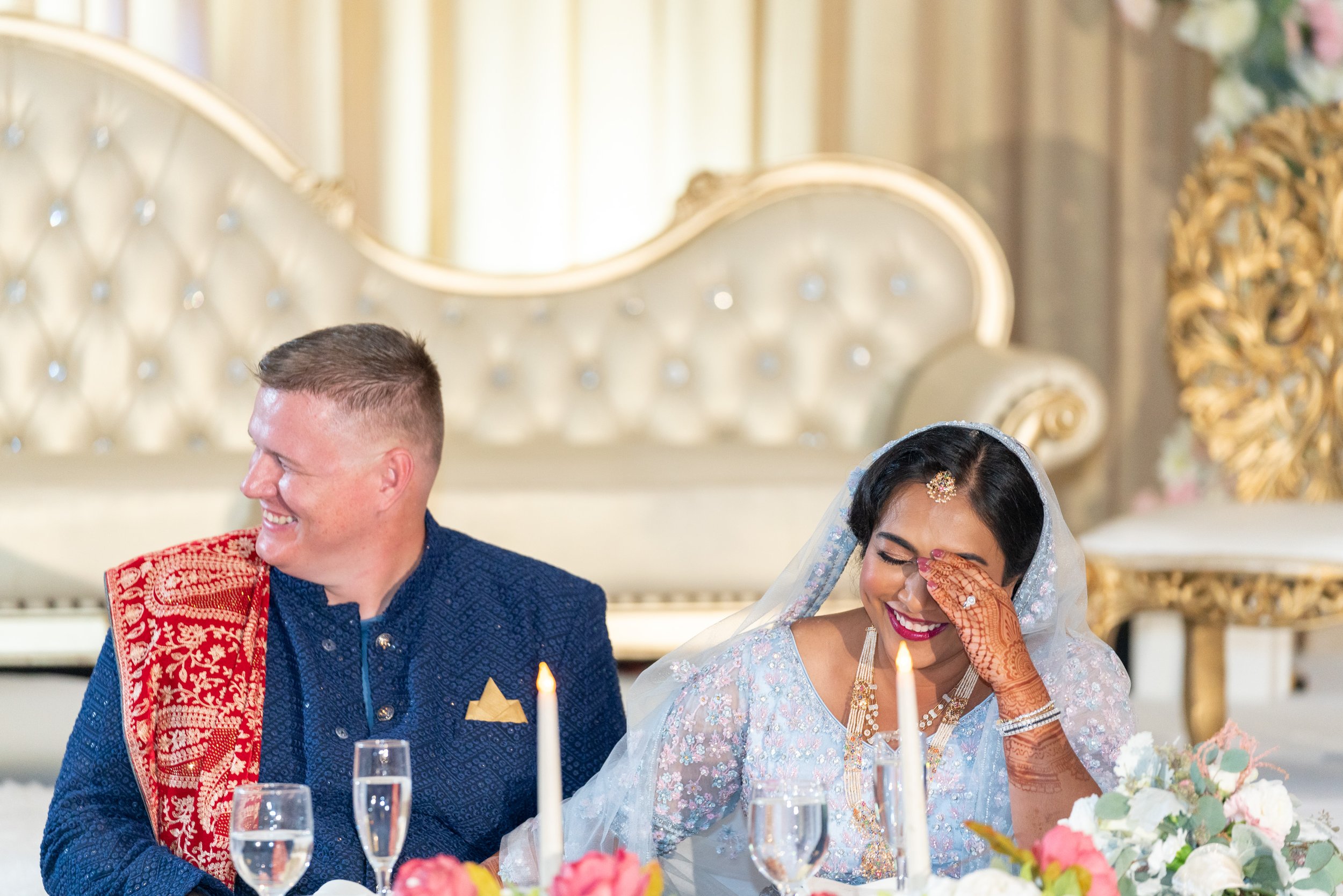 bride and groom react to fun speeches at Hyatt Dulles