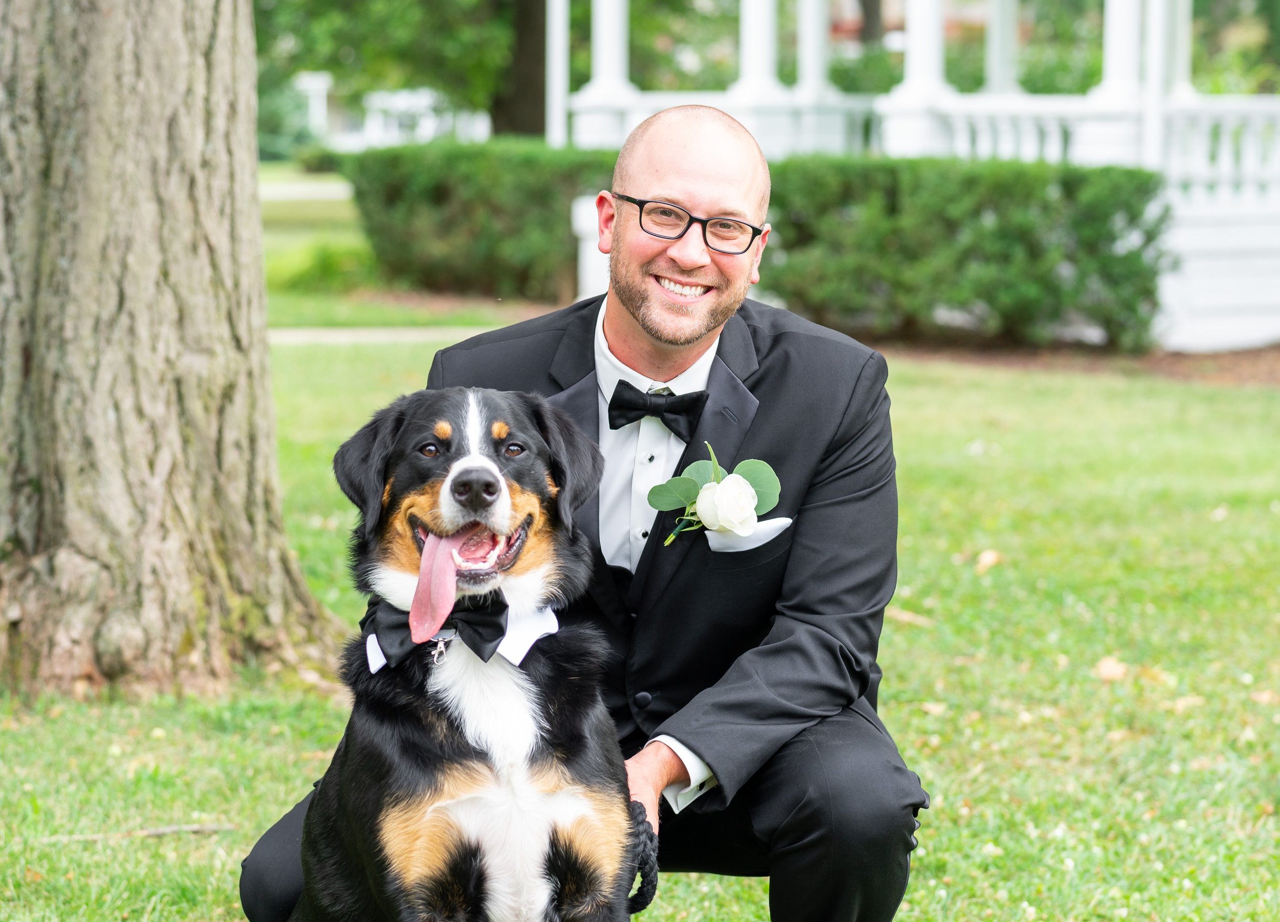 Groom waits with Bernese Mountain Dog at President Lincoln's Cottage wedding