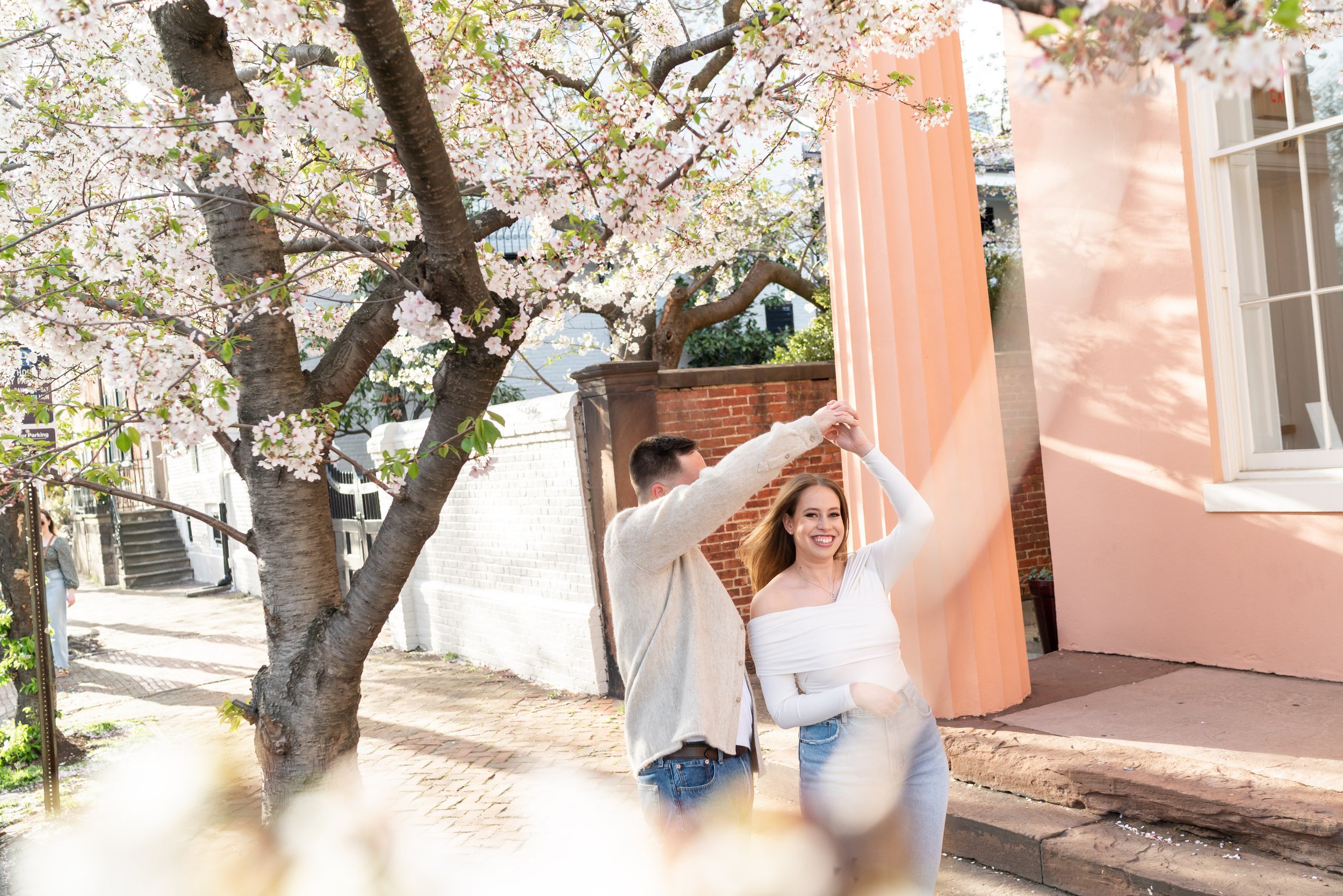Cherry blossom engagement session in Old Town Alexandria on Prince St 